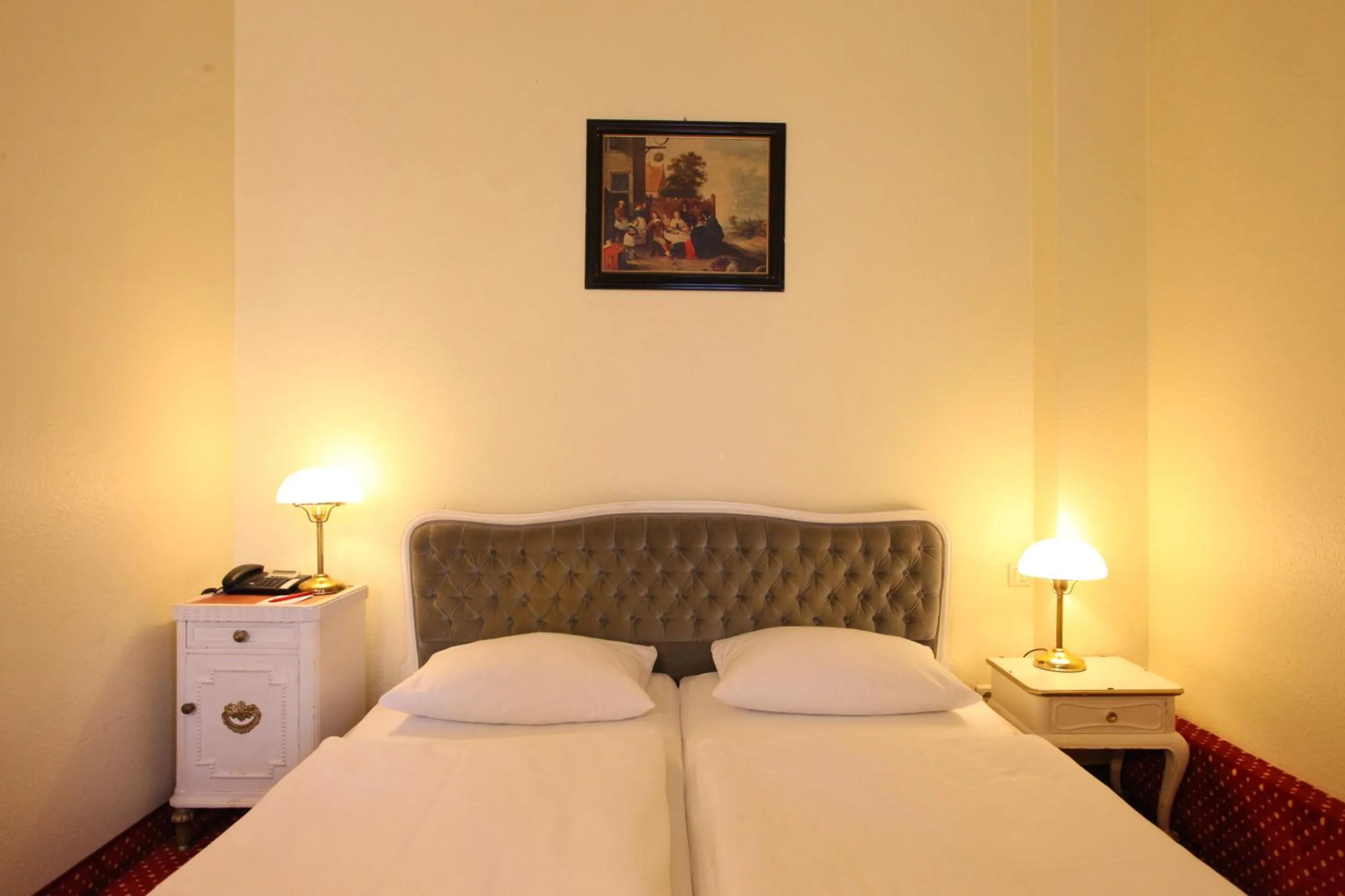 Bed in acom Hotel Berlin Kurfürstendamm