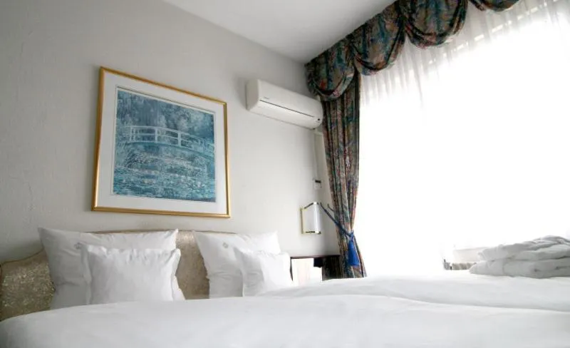 Photo of the whole room, Bed in Hotel Königshof The Arthouse