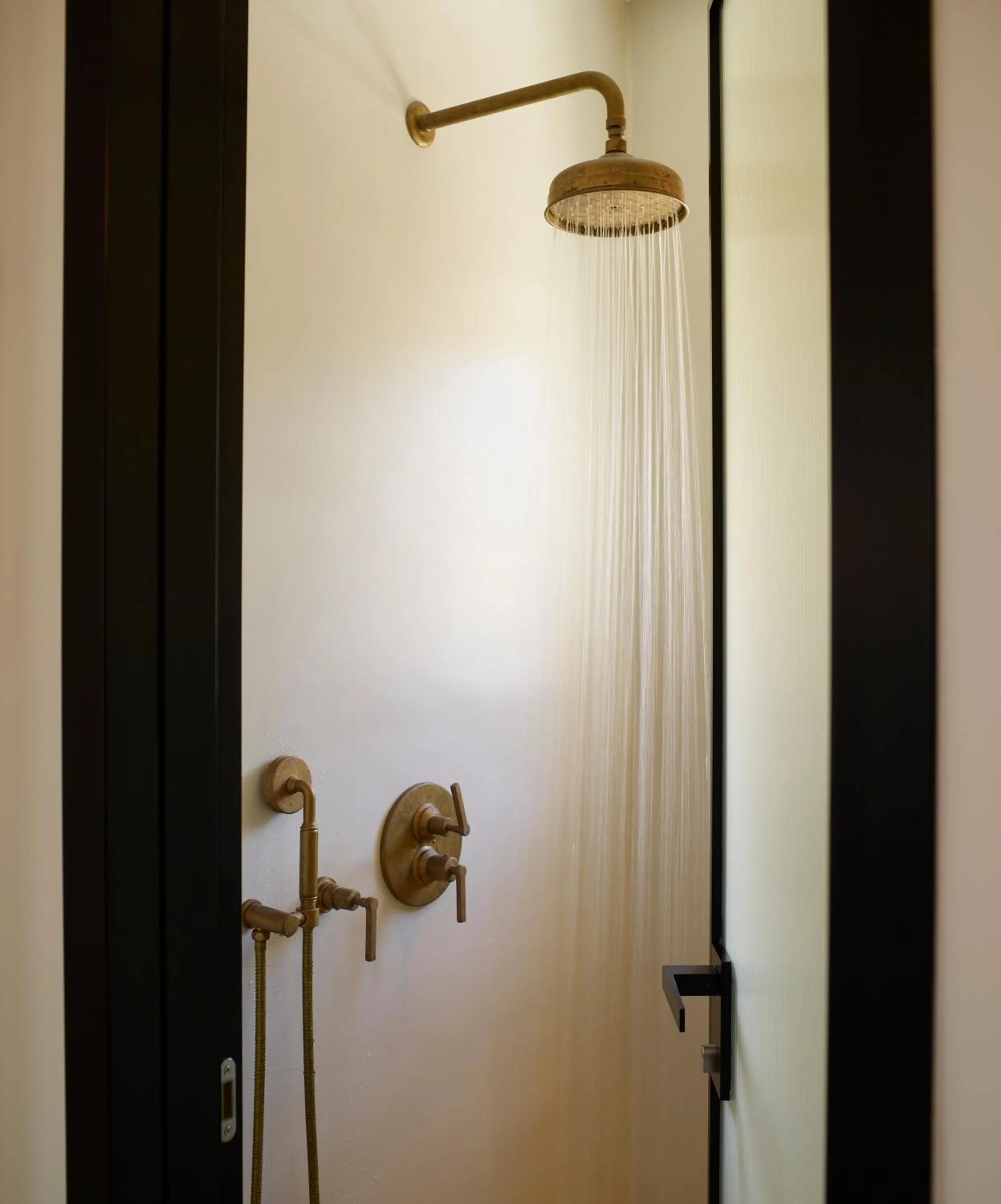 Shower in Bonzoe Suites & Villas