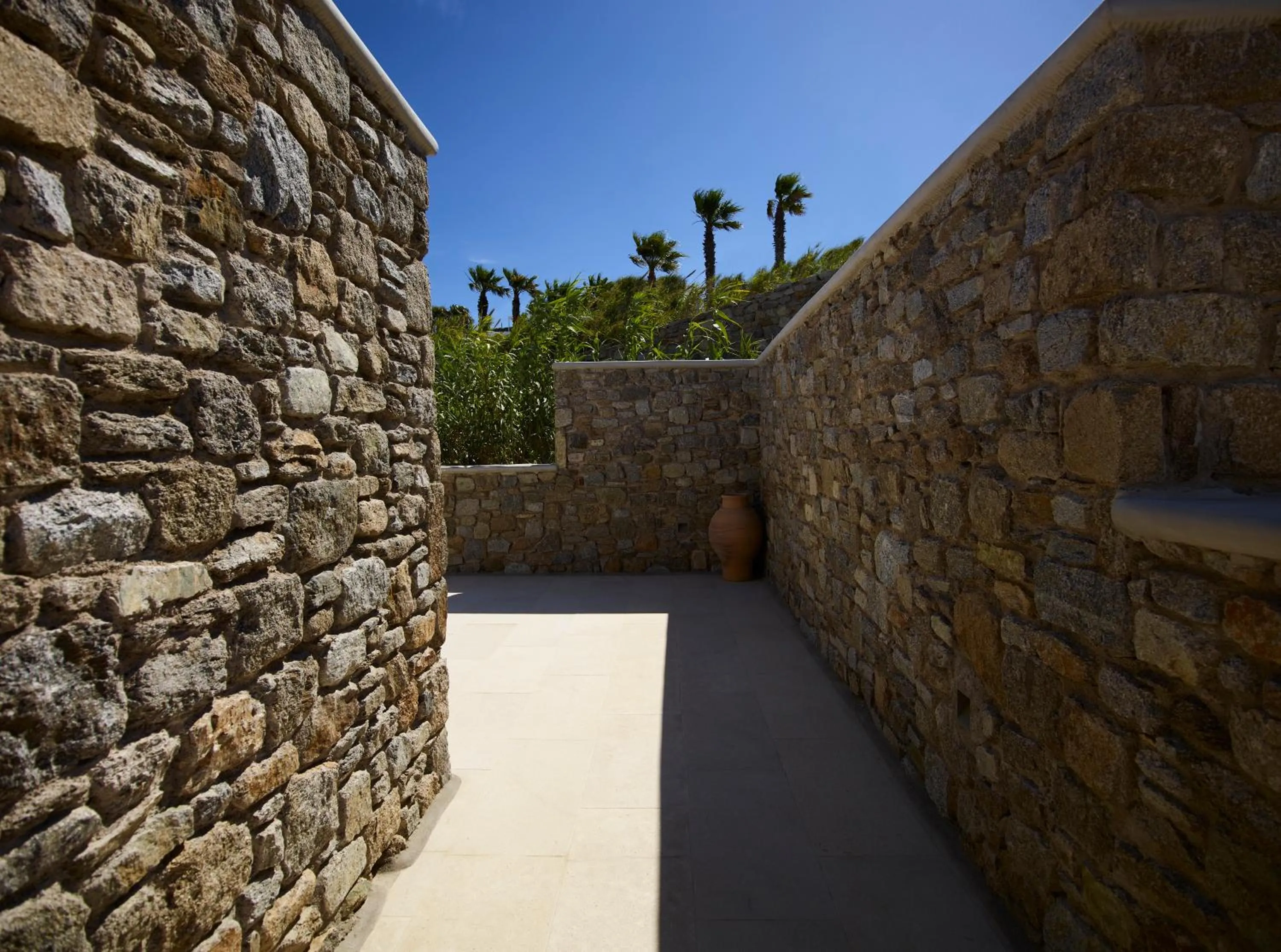 Facade/entrance in Bonzoe Suites & Villas