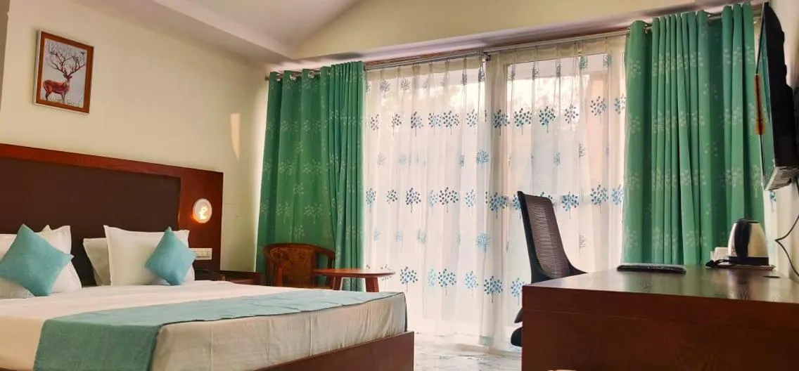 Bed in Aranya Resort by Mrugavani