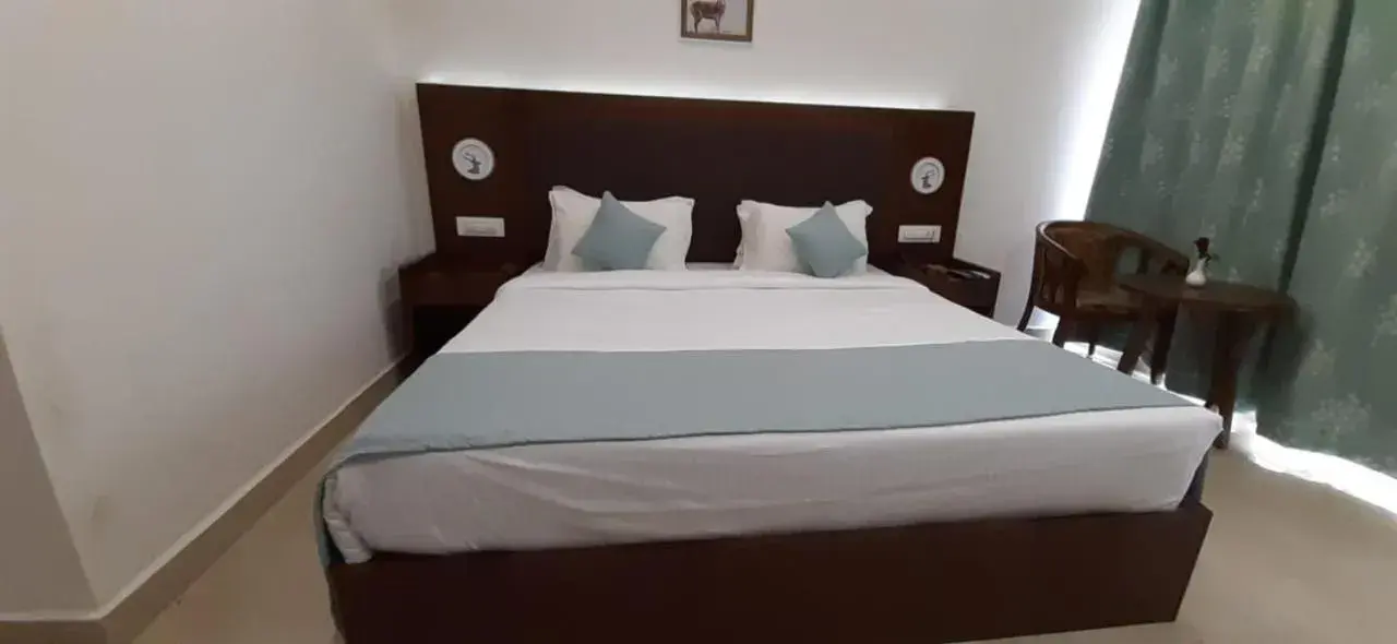 Bed in Aranya Resort by Mrugavani Bed in Aranya Resort by Mrugavani