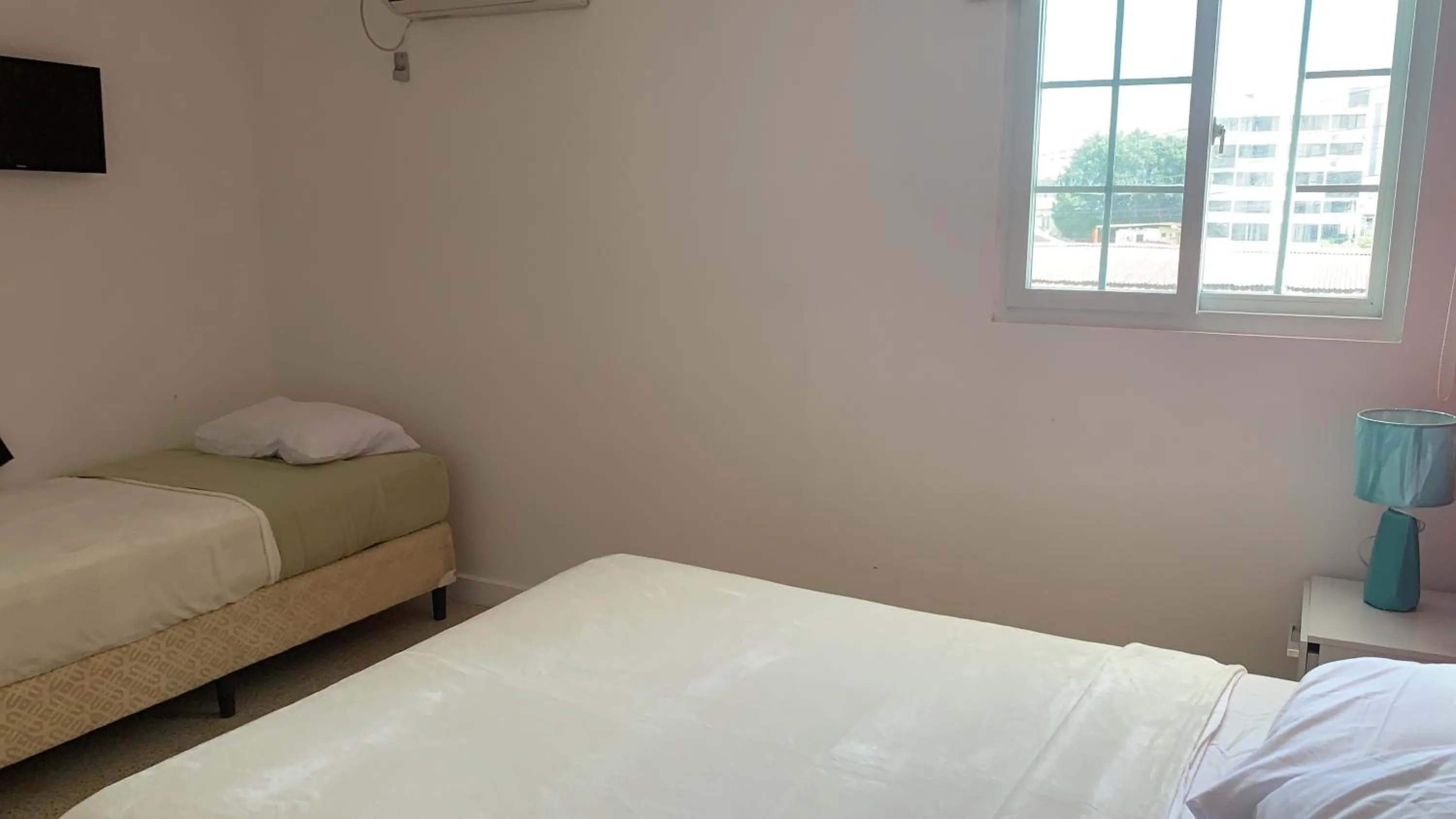 Bed in Hostal Familiar Carmencita