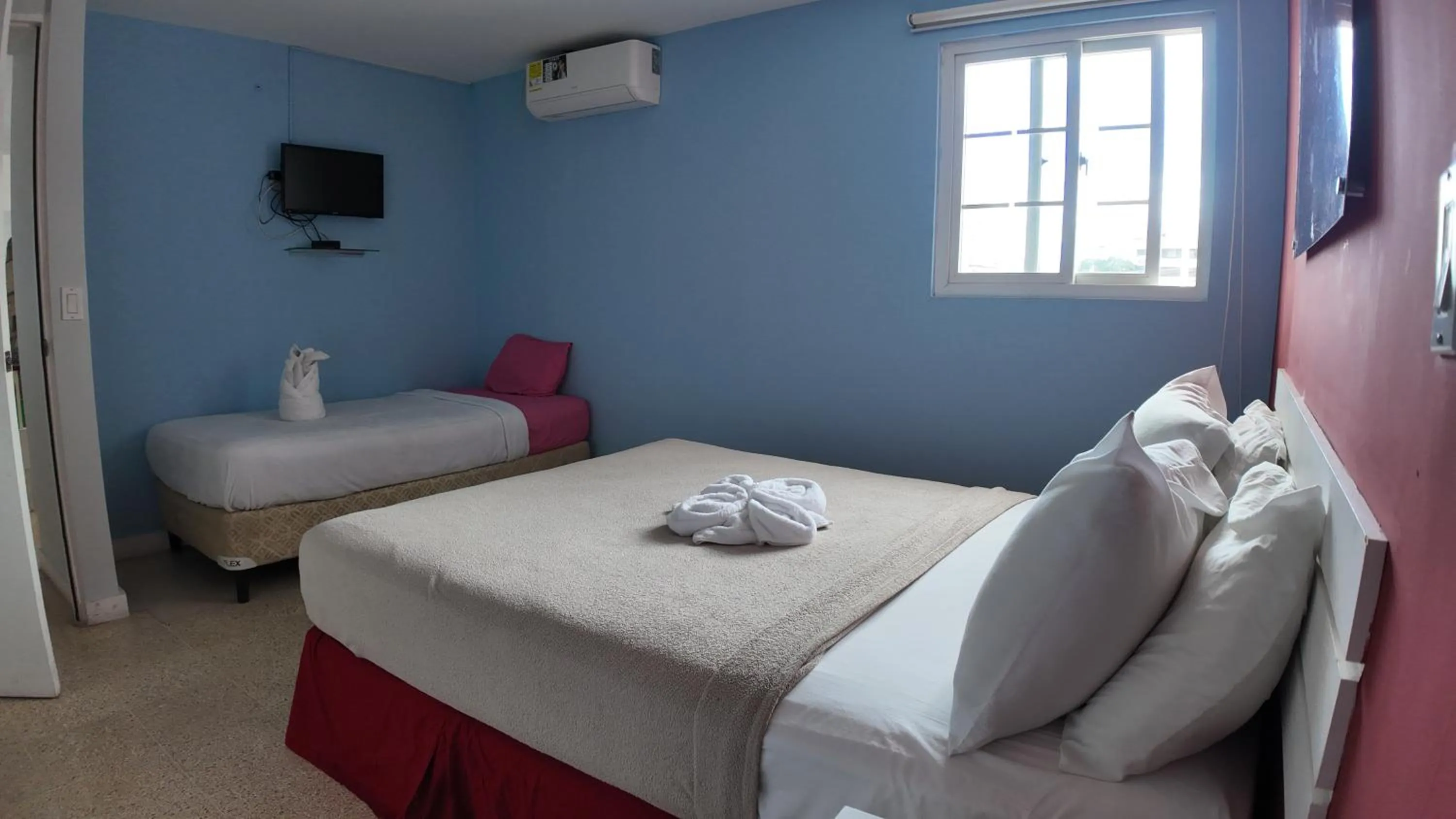 Bed in Hostal Familiar Carmencita