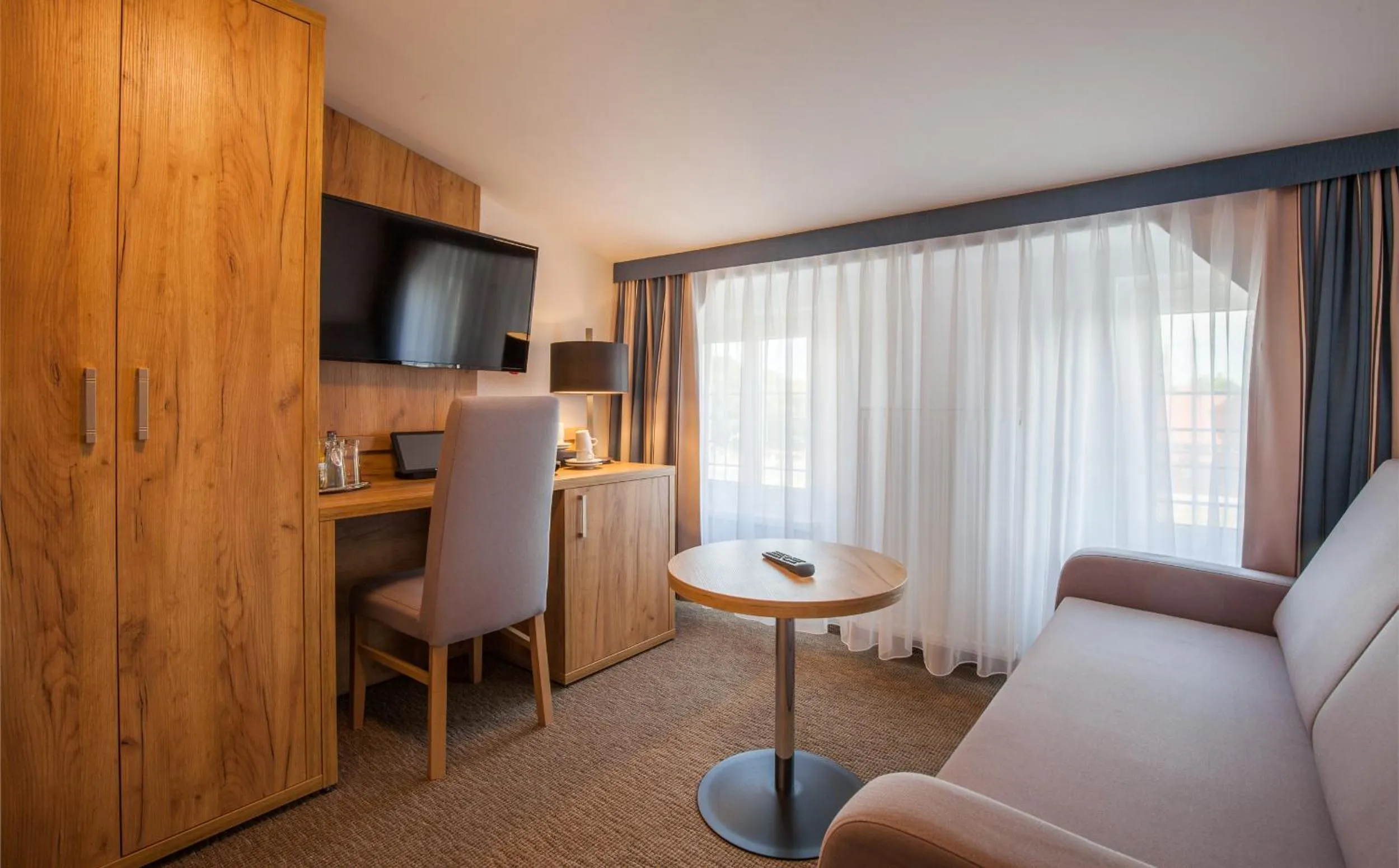 TV and multimedia in Sure Hotel by Best Western Wilhelmshaven City