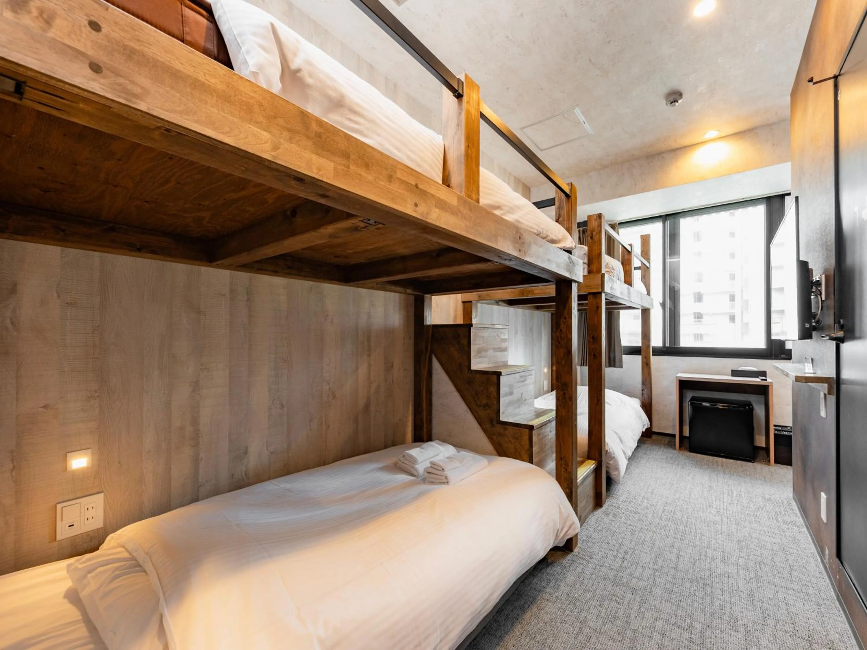 Bed in WELLSTAY Namba