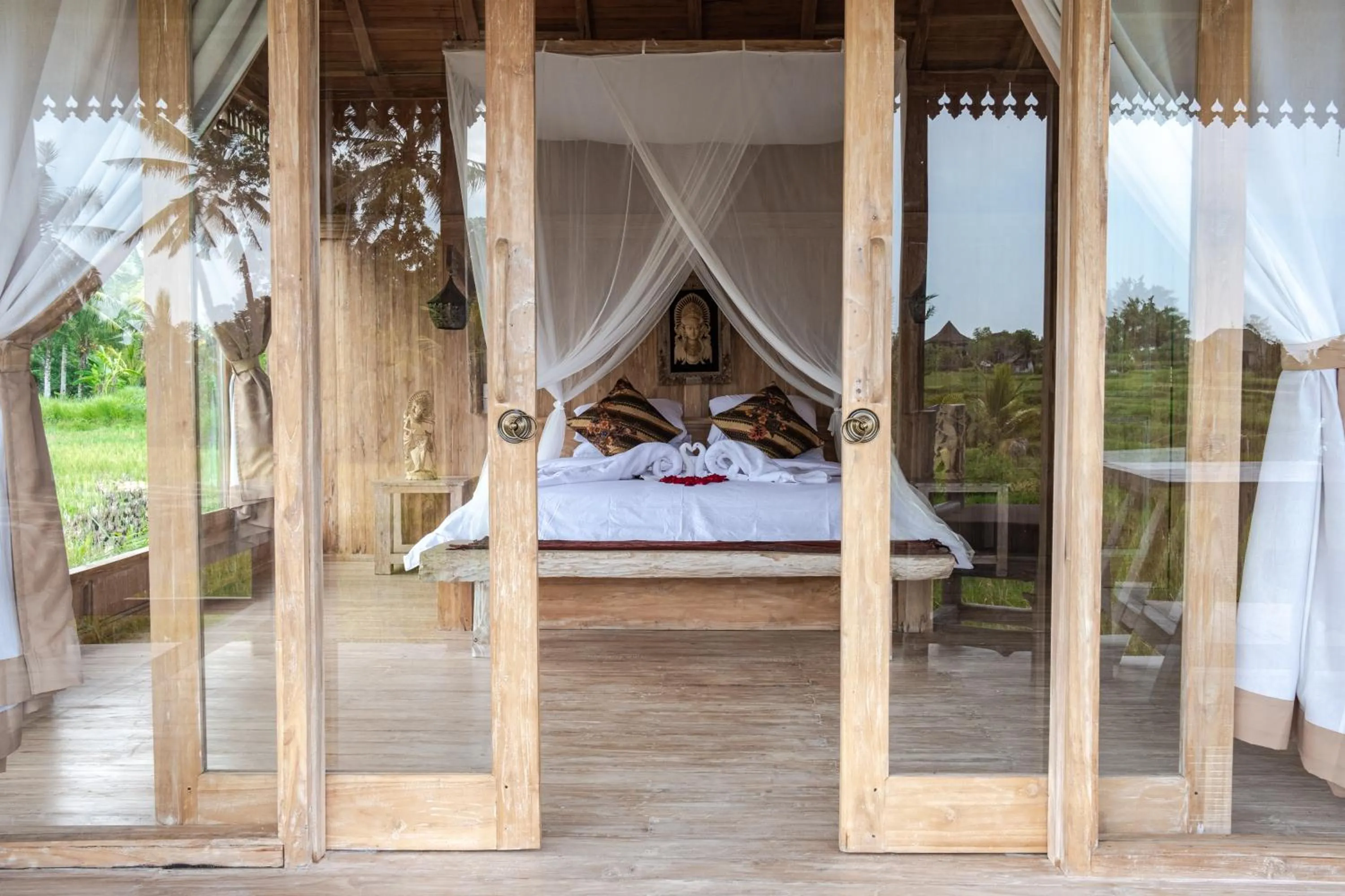 Bed in Kidem Ubud Villas