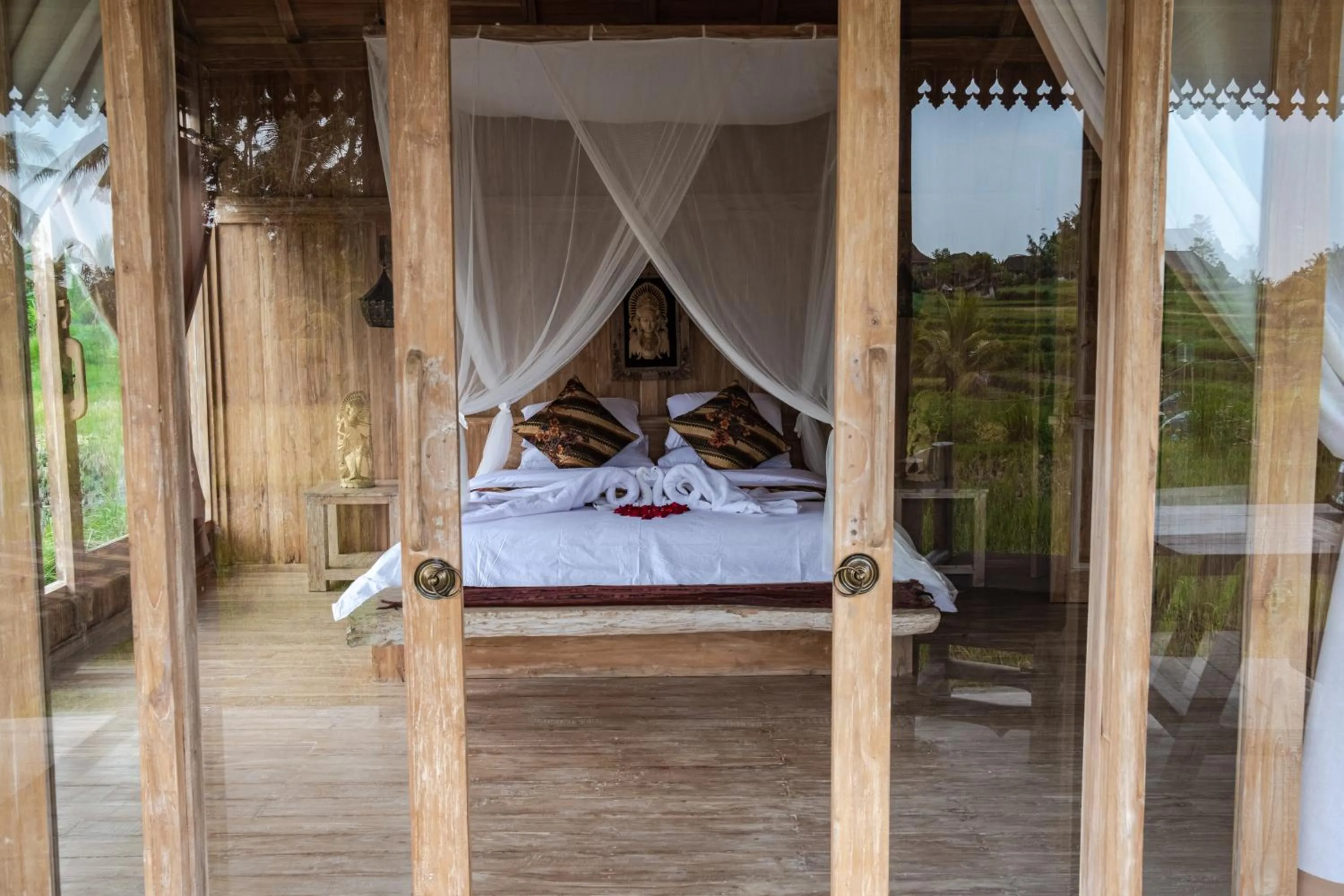 Bed in Kidem Ubud Villas