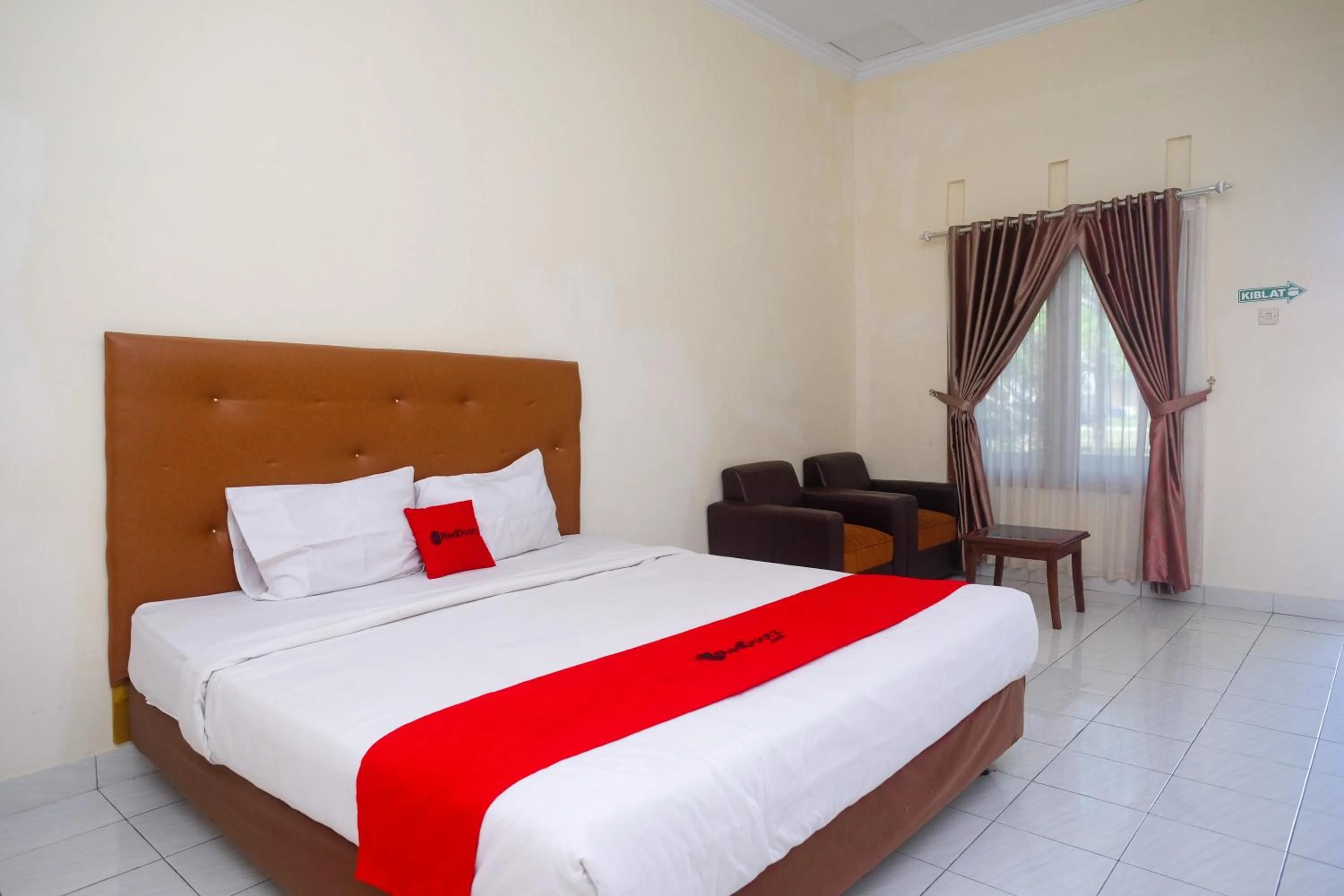 Bed in RedDoorz Syariah near Alun Alun Wonosari