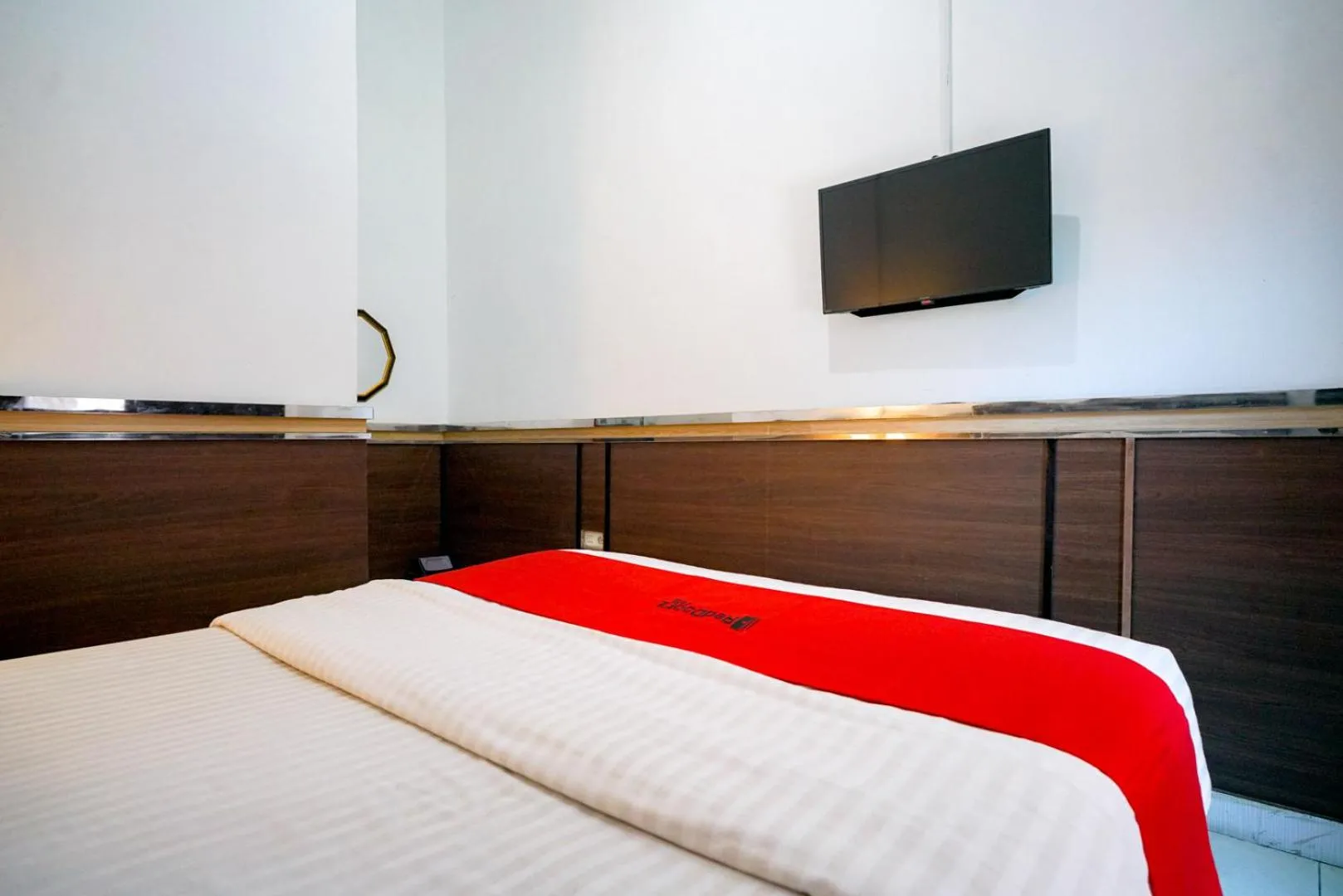 Bed in RedDoorz Syariah near Unila Lampung