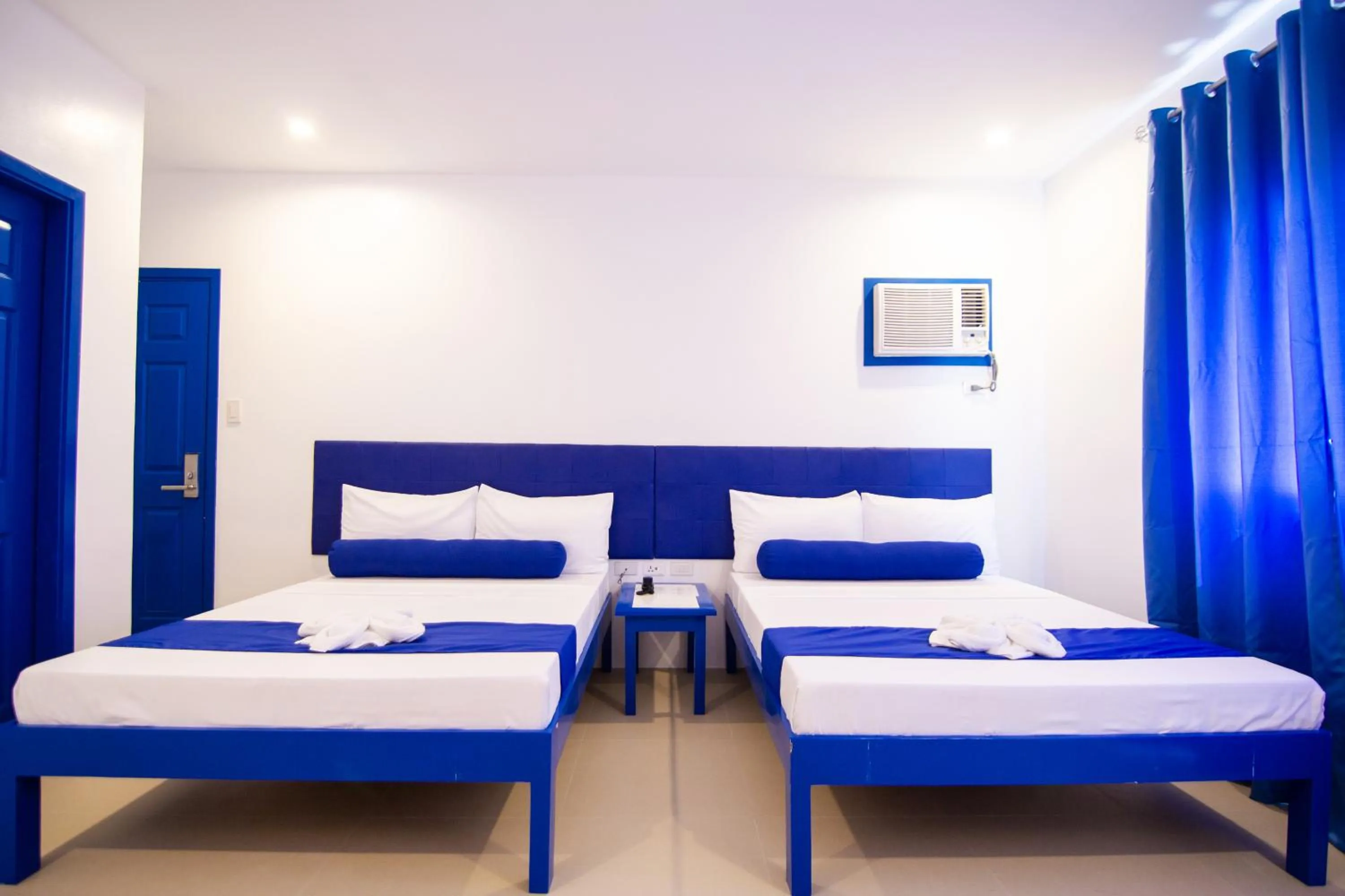 Photo of the whole room, Bed in Skytel Palawan