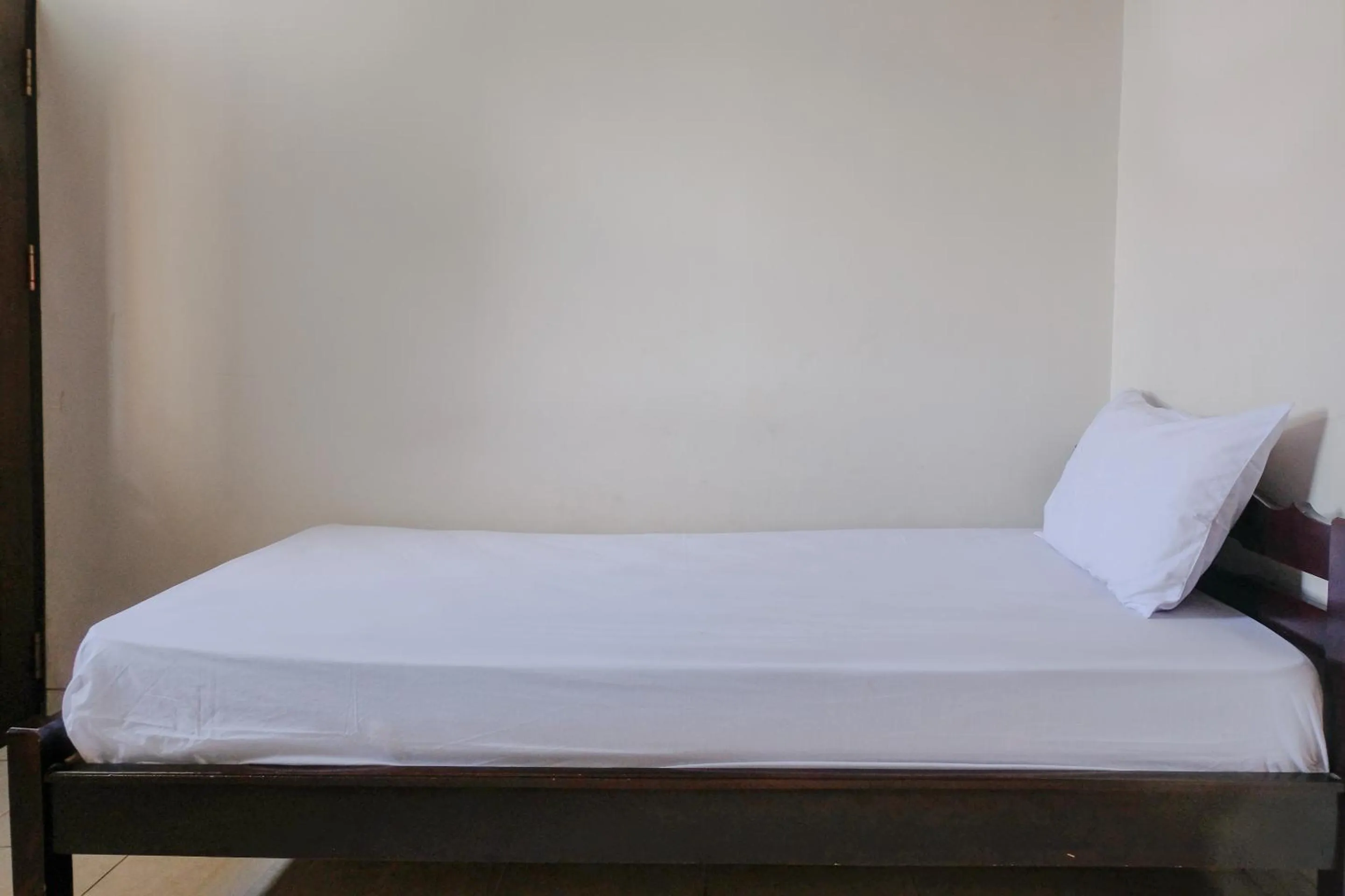 Bedroom in OYO Life 2744 Guest House Qudsi