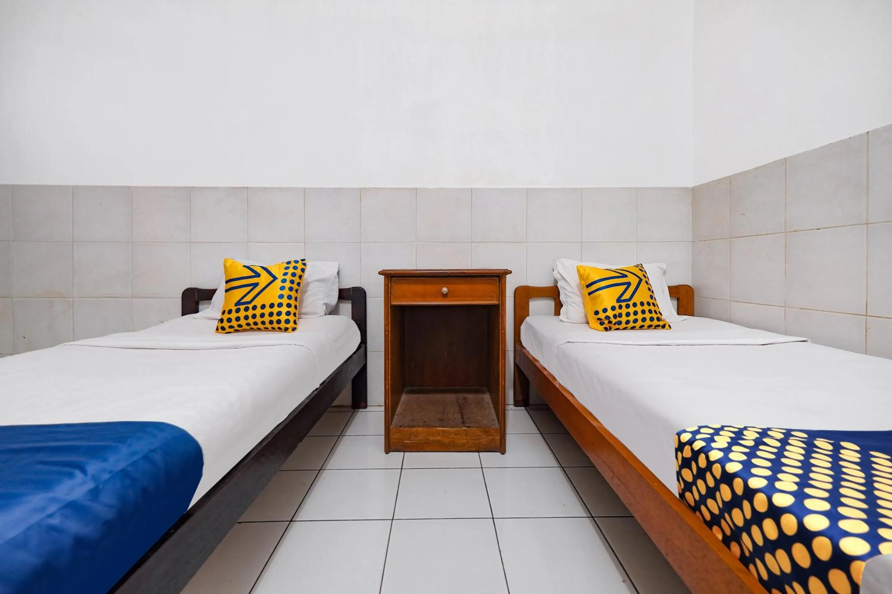 Bedroom in SUPER OYO 2865 Sartika Inn Pati