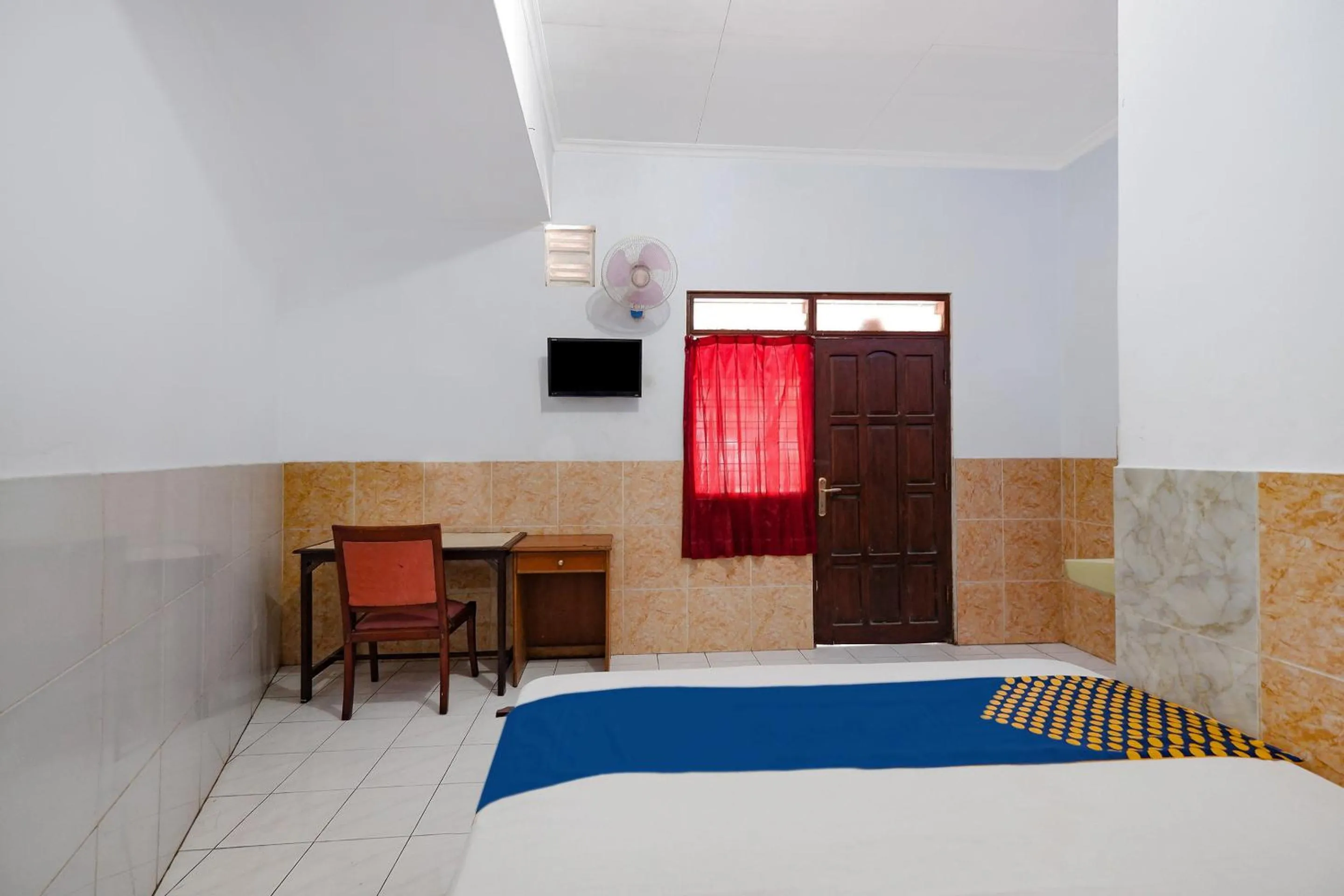 Bedroom in SUPER OYO 2865 Sartika Inn Pati