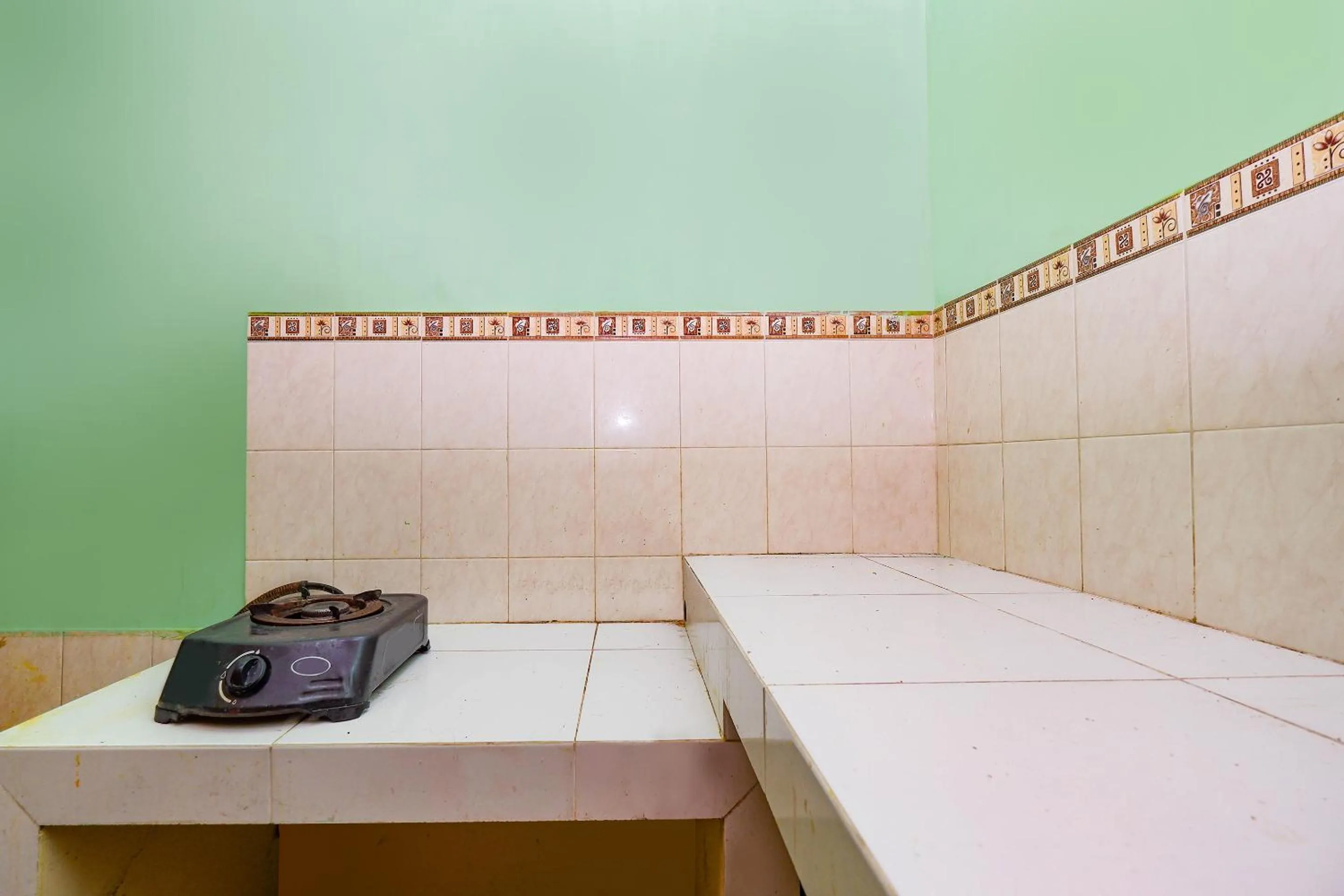 Kitchen or kitchenette in OYO Life 2867 Kos Kuning