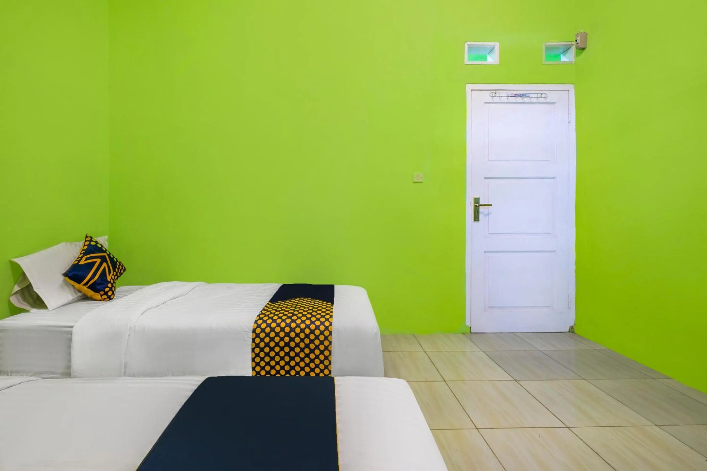 Bedroom in OYO 2859 Fatan Costel Syariah