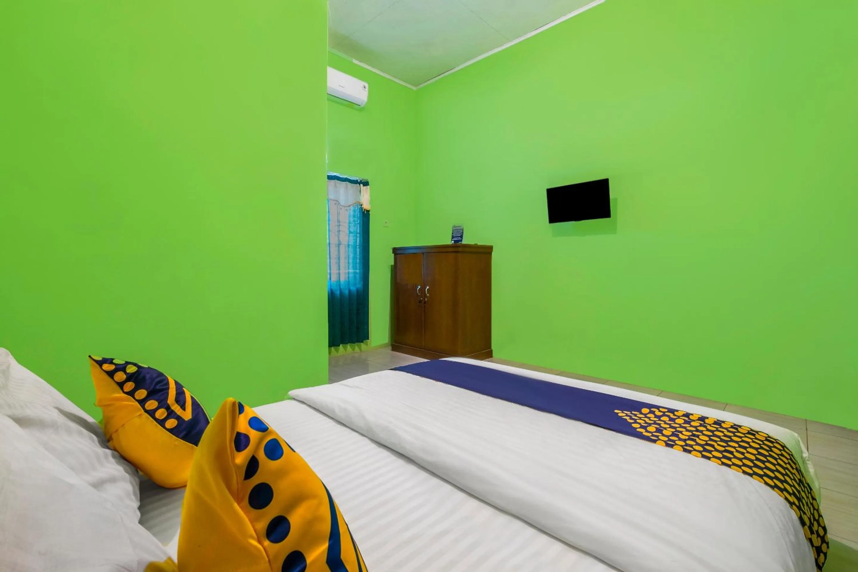 Bedroom in OYO 2859 Fatan Costel Syariah