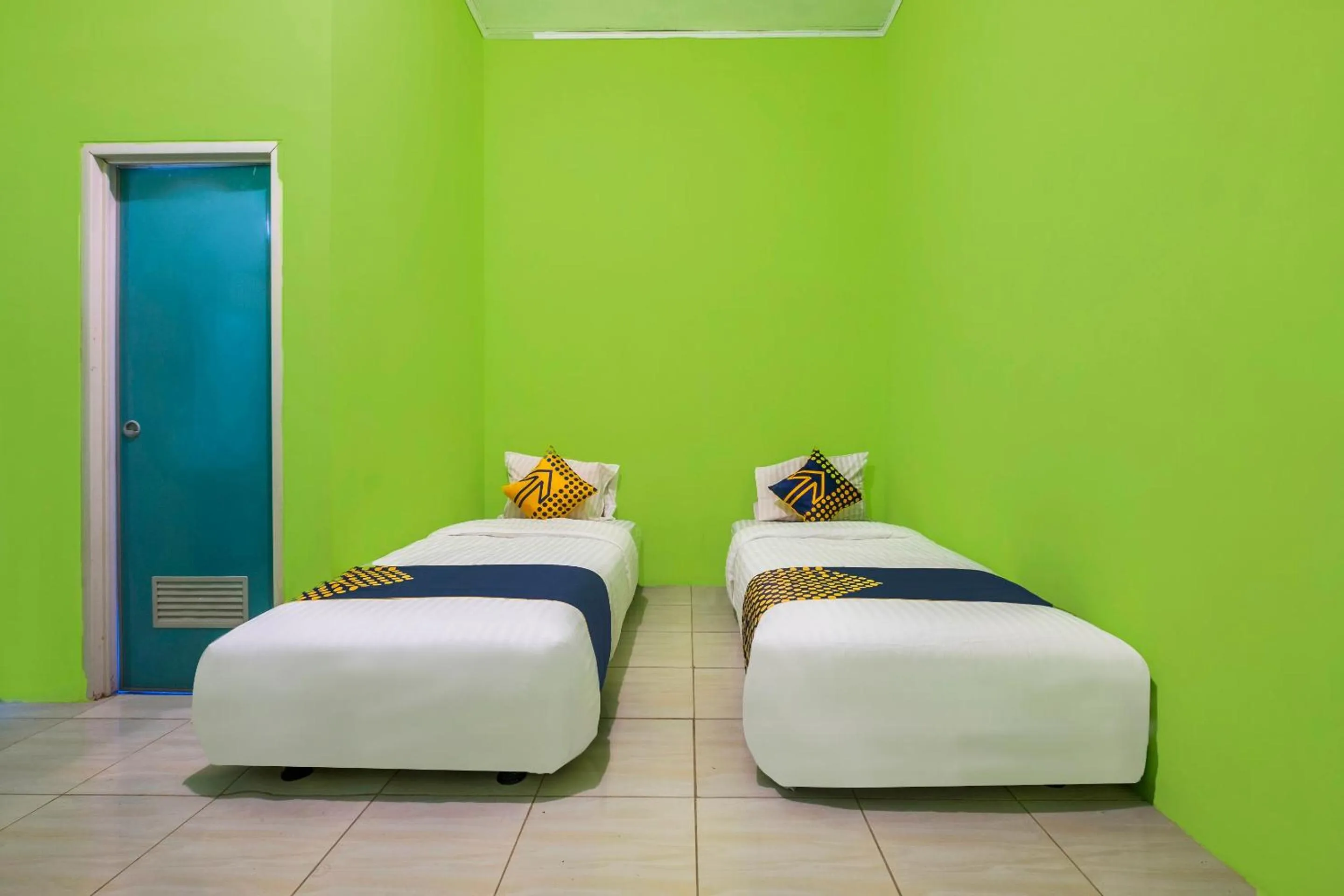 Bedroom in OYO 2859 Fatan Costel Syariah