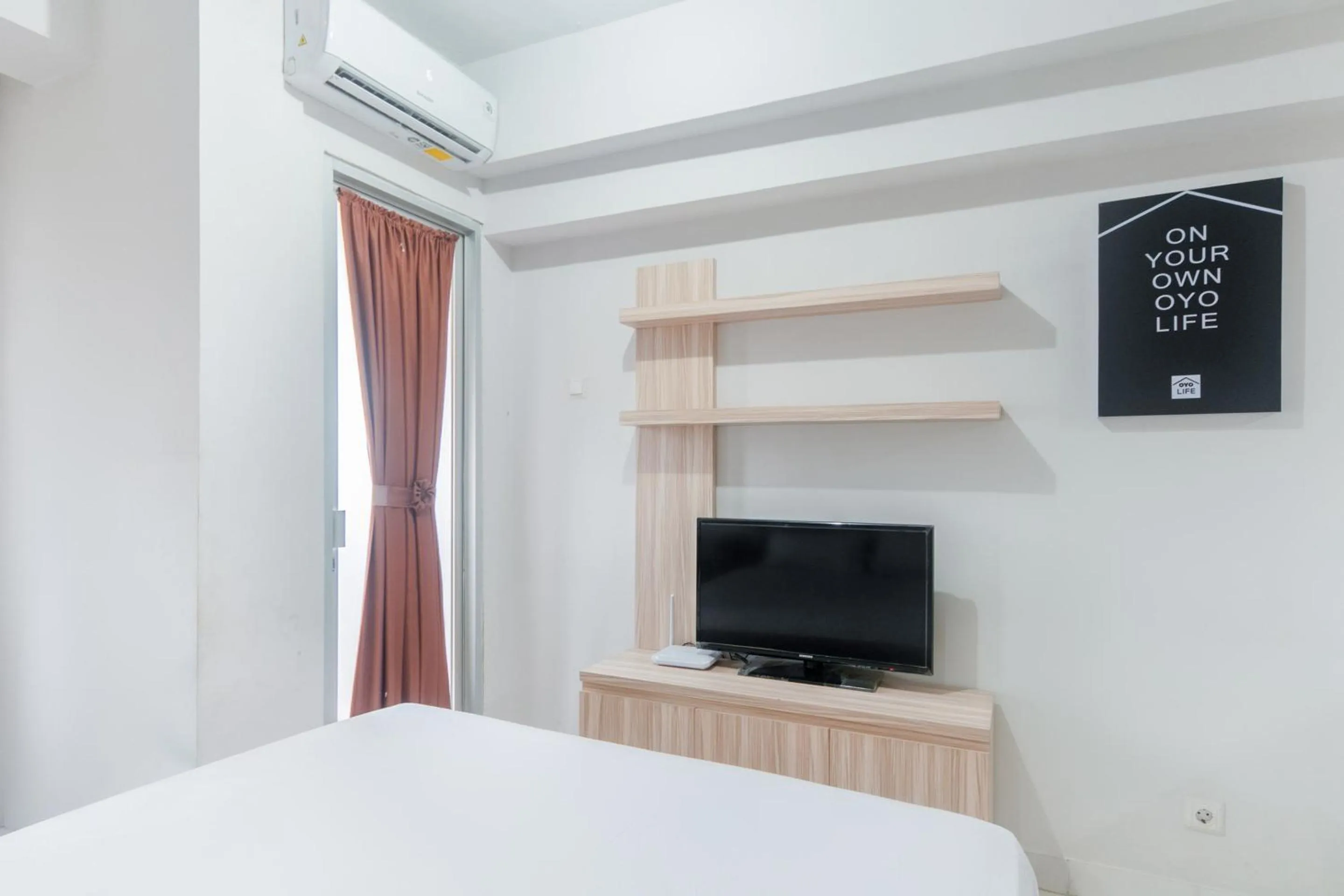 Bedroom, Bed in OYO Life 2837 Apartment Dramaga Tower