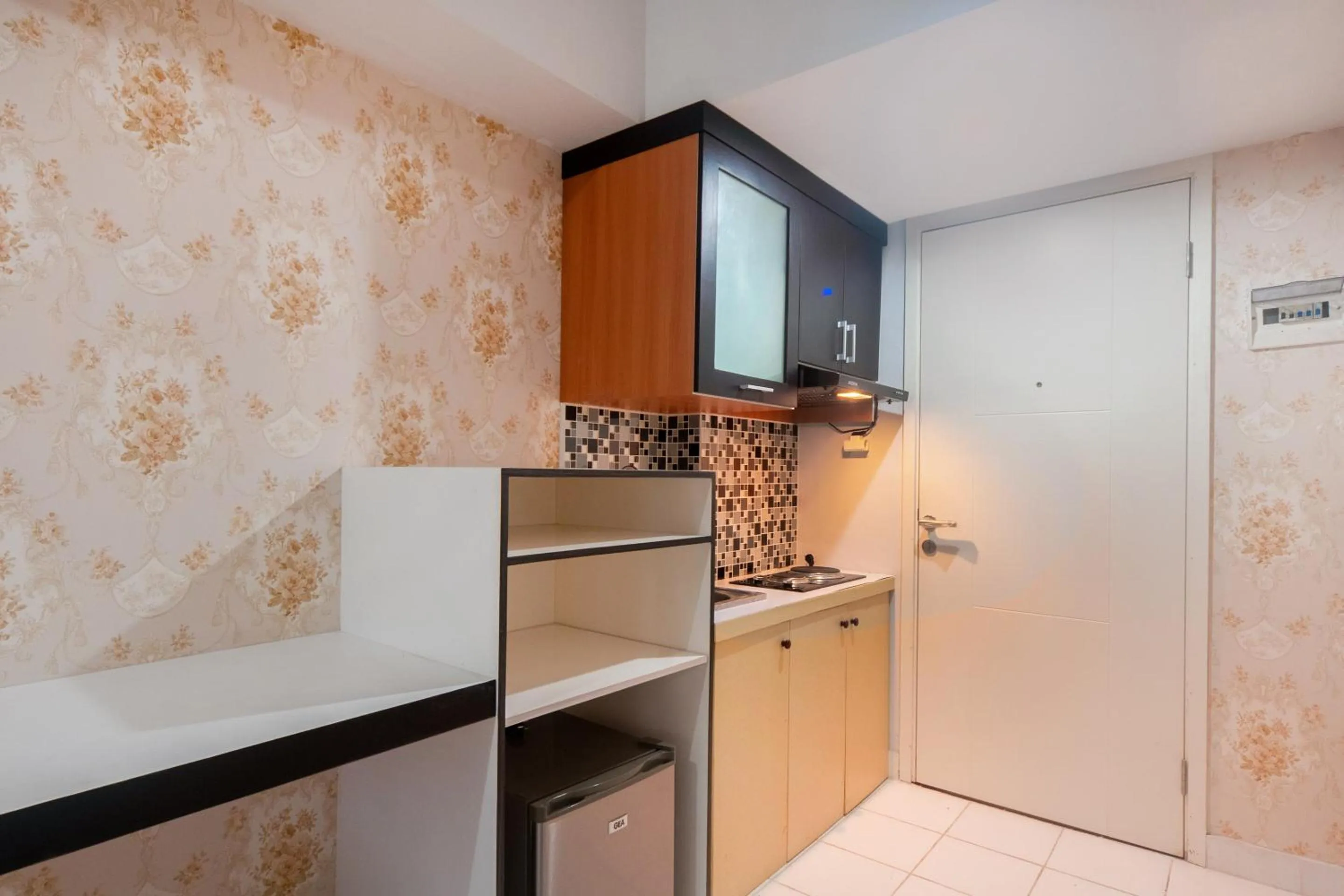 Kitchen or kitchenette in OYO Life 2837 Apartment Dramaga Tower