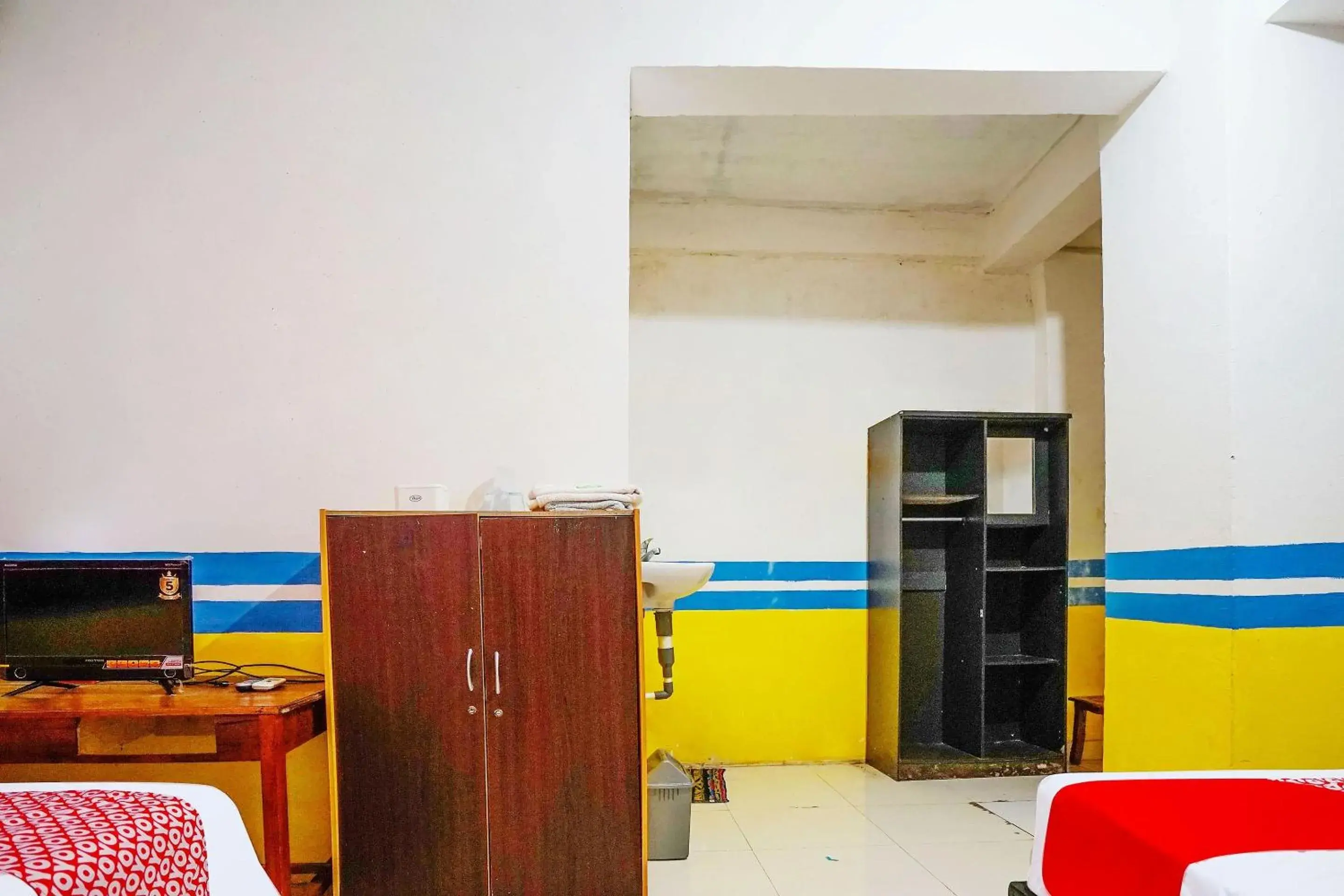 Bedroom in OYO Life 2820 Hotel Perdana Syariah Bedroom in OYO Life 2820 Hotel Perdana Syariah