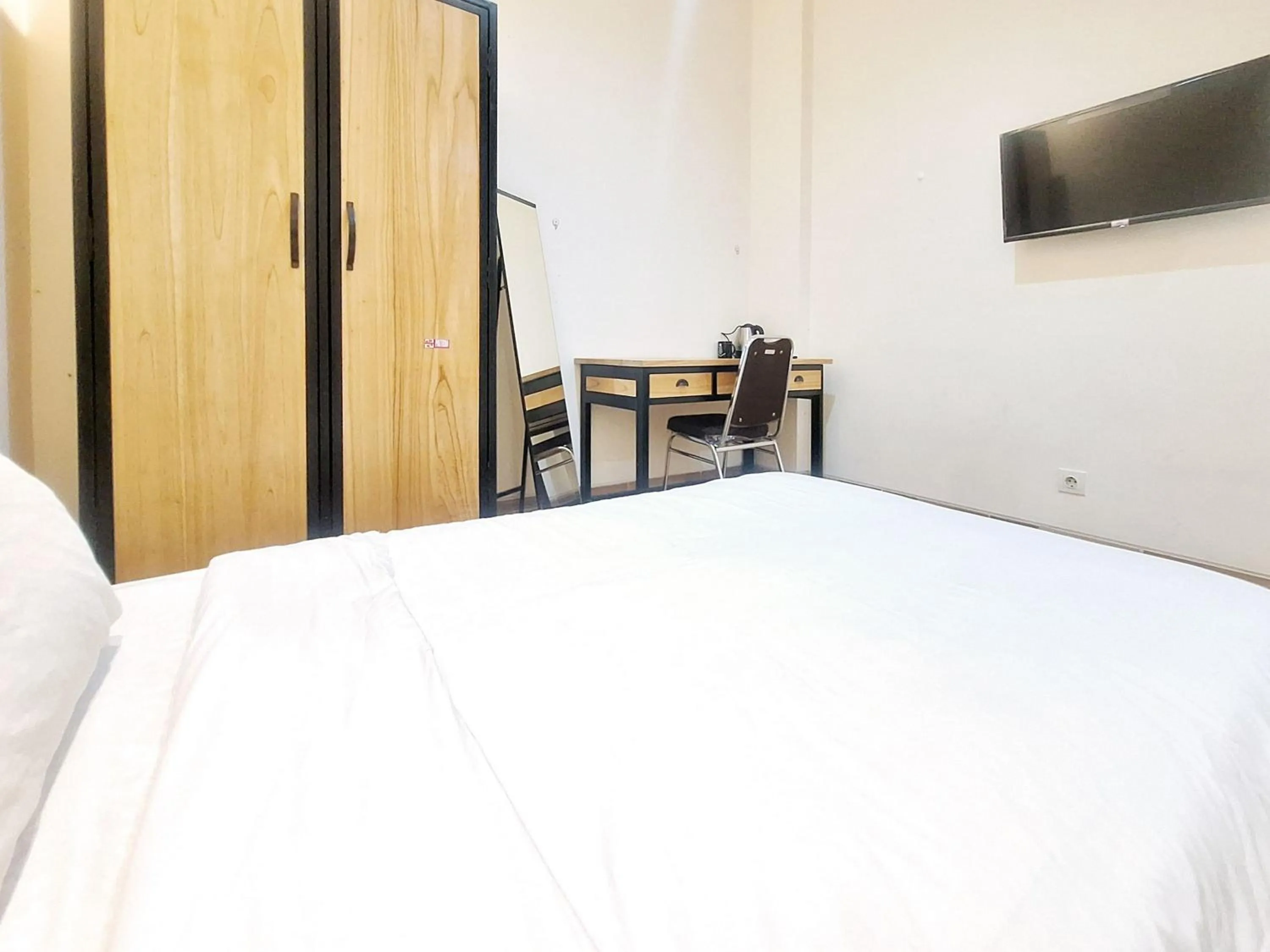 Bedroom, Bed in Sari Panguripan RedPartner Near UGM