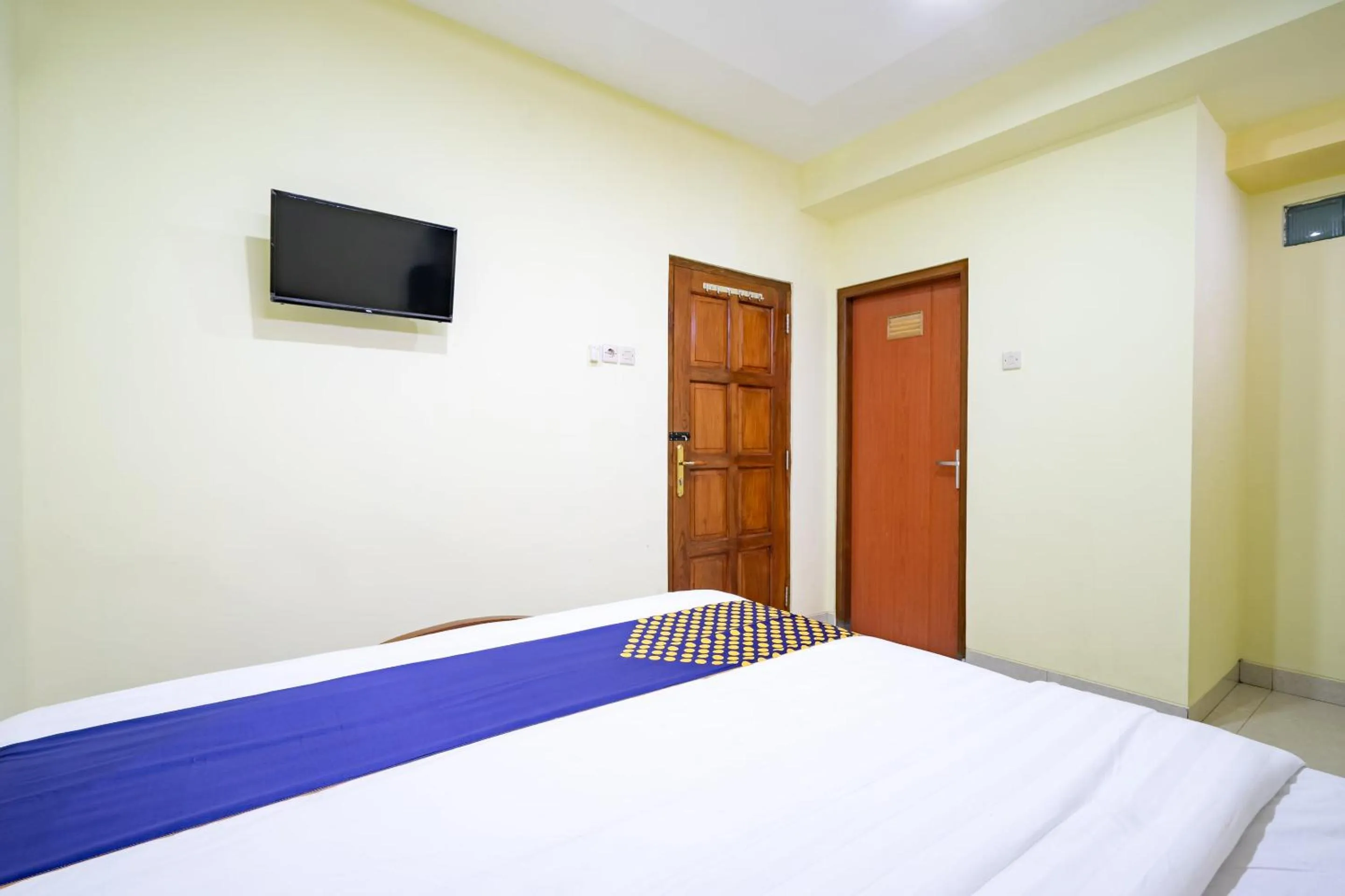 Bedroom, Bed in Hotel O Nabila Homestay