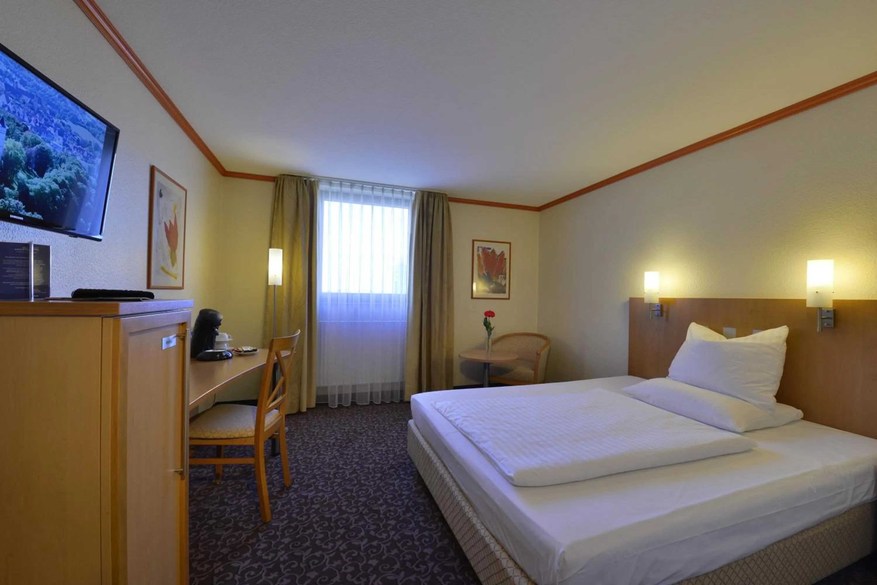 Bedroom, Bed in PLAZA INN Leonberg