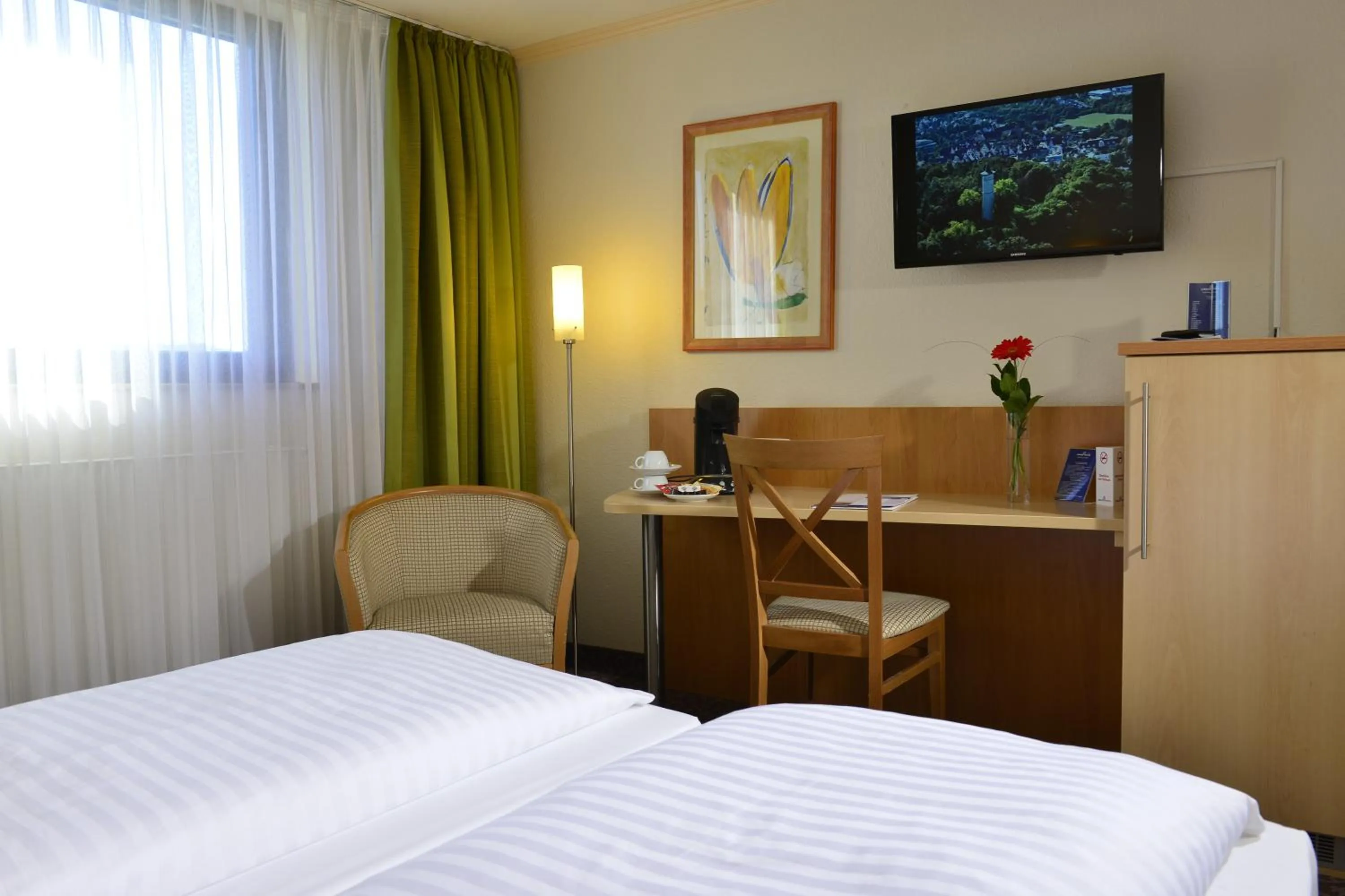 Bedroom, Bed in PLAZA INN Leonberg