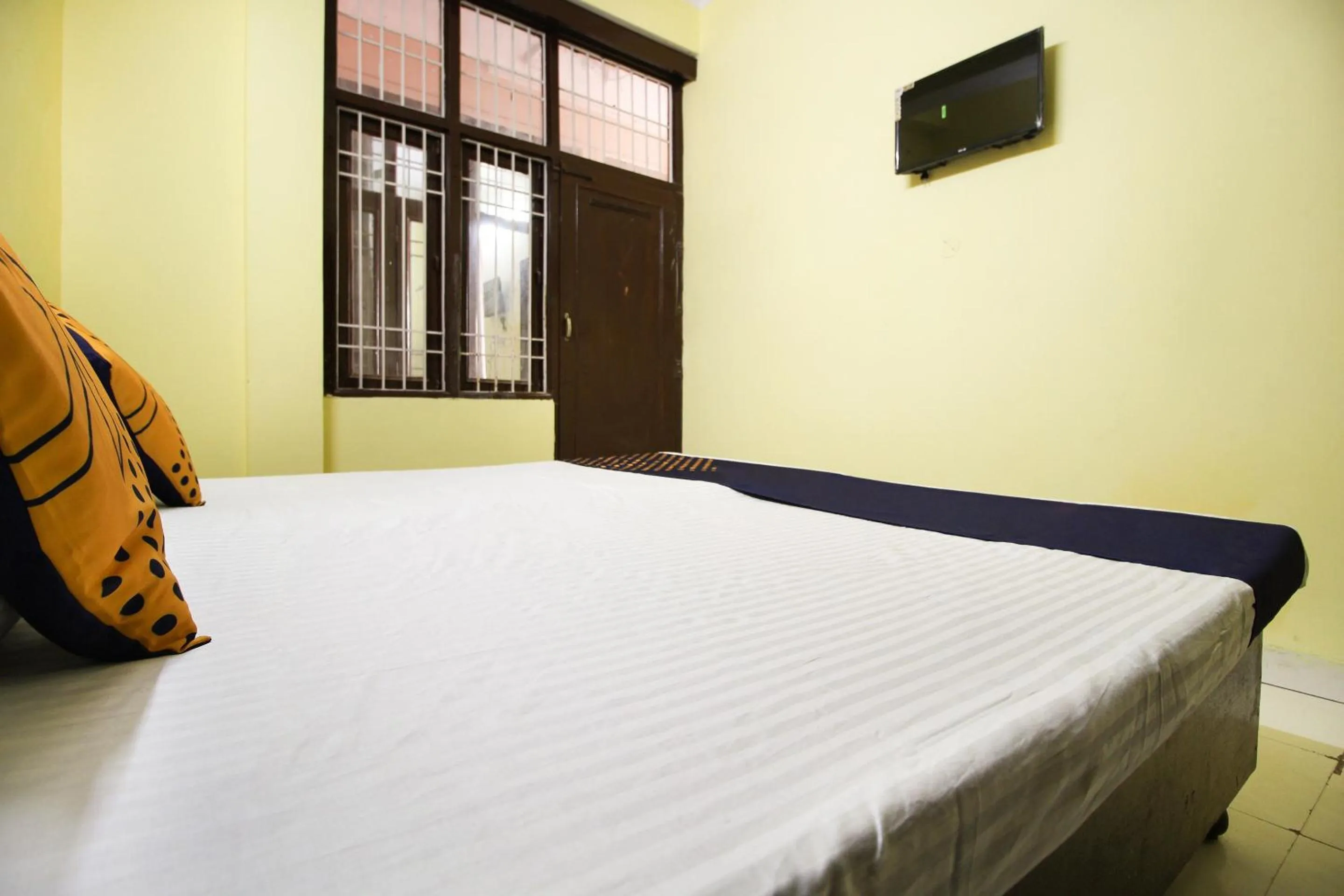 Bedroom in Collection O Hotel Kavya Guest House