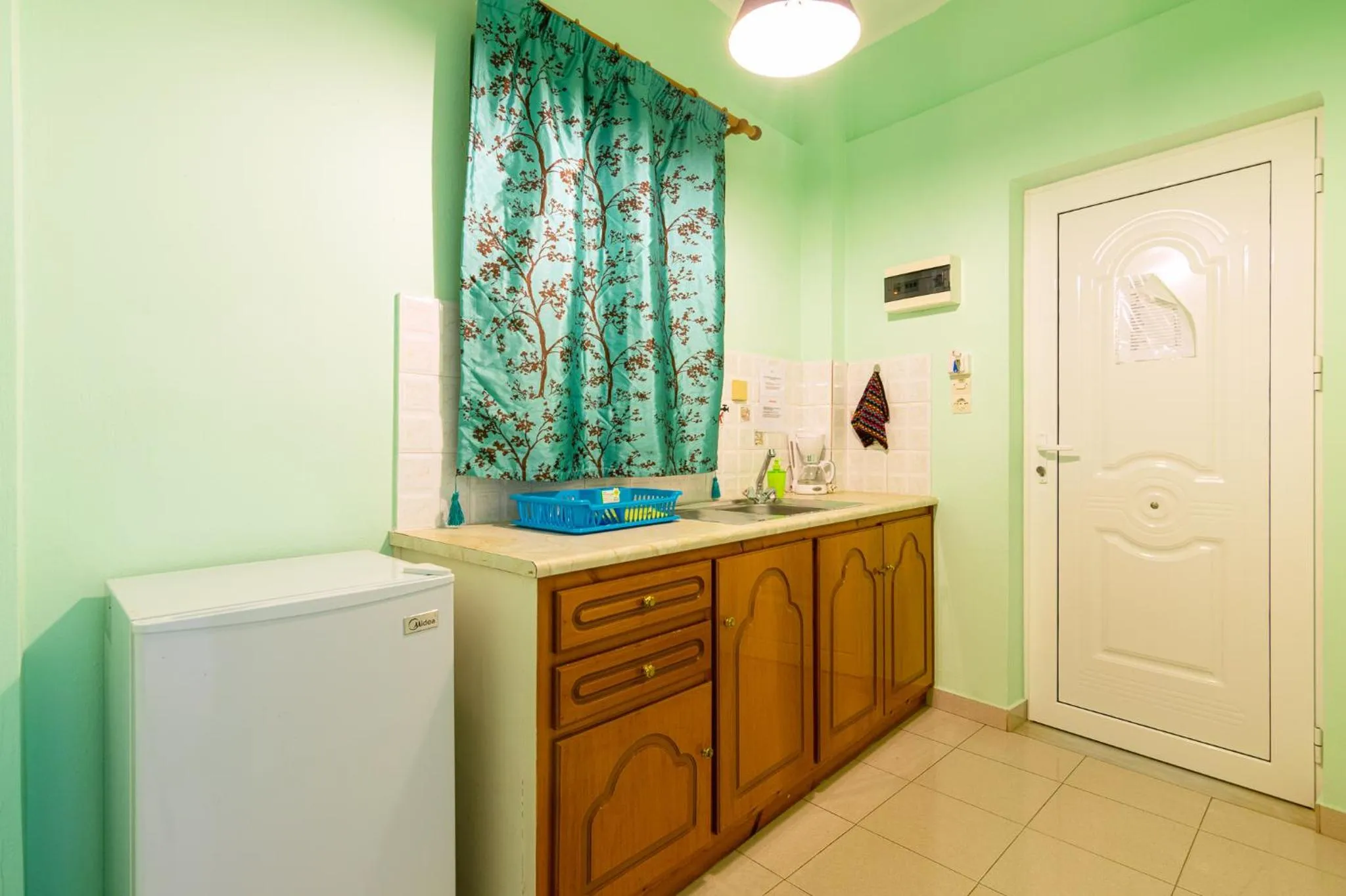 Kitchen or kitchenette in Ni-Mar Studios & Apartments