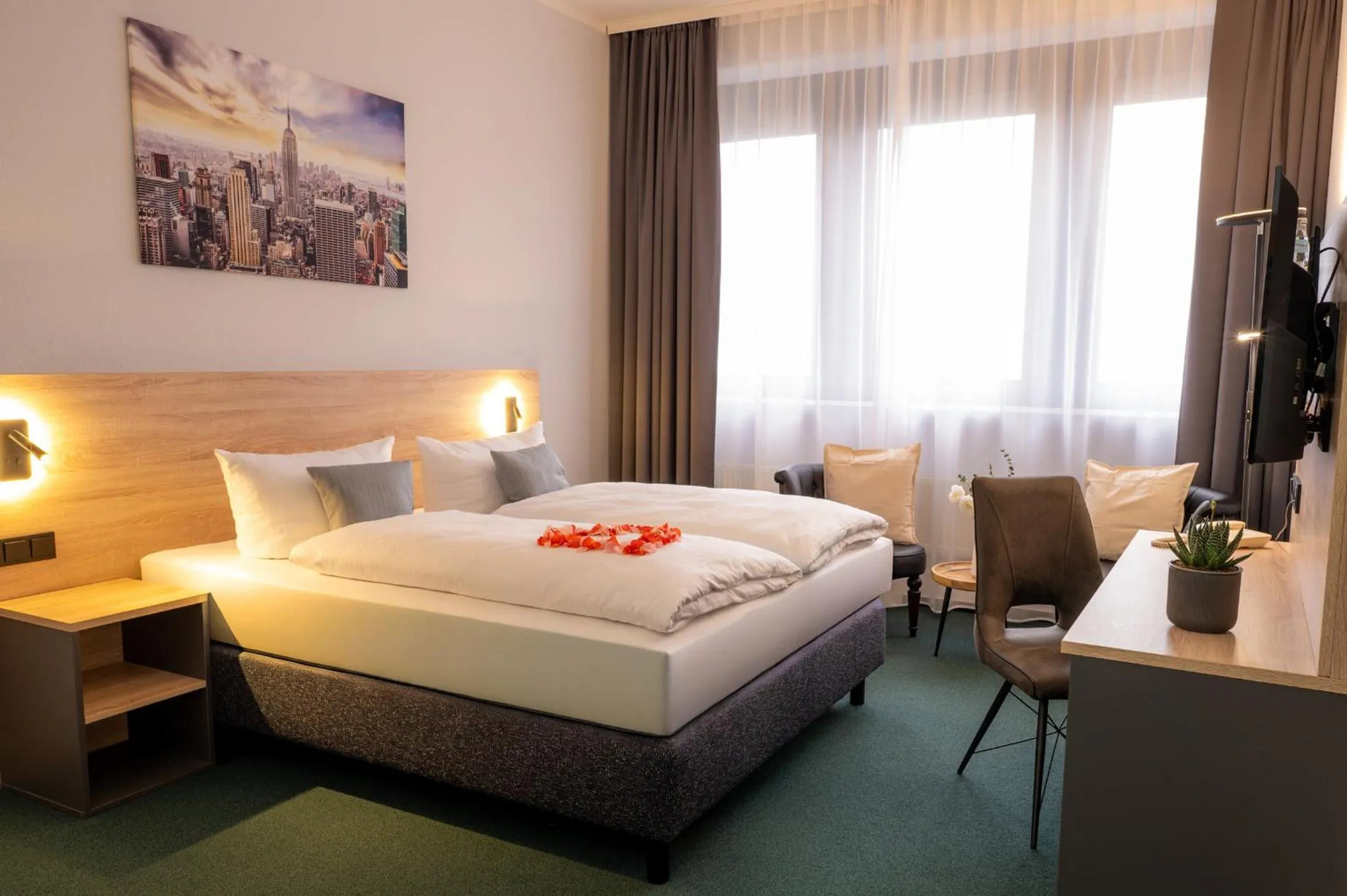 Living room, Bed in Best Western Comfort Business Hotel Düsseldorf-Neuss