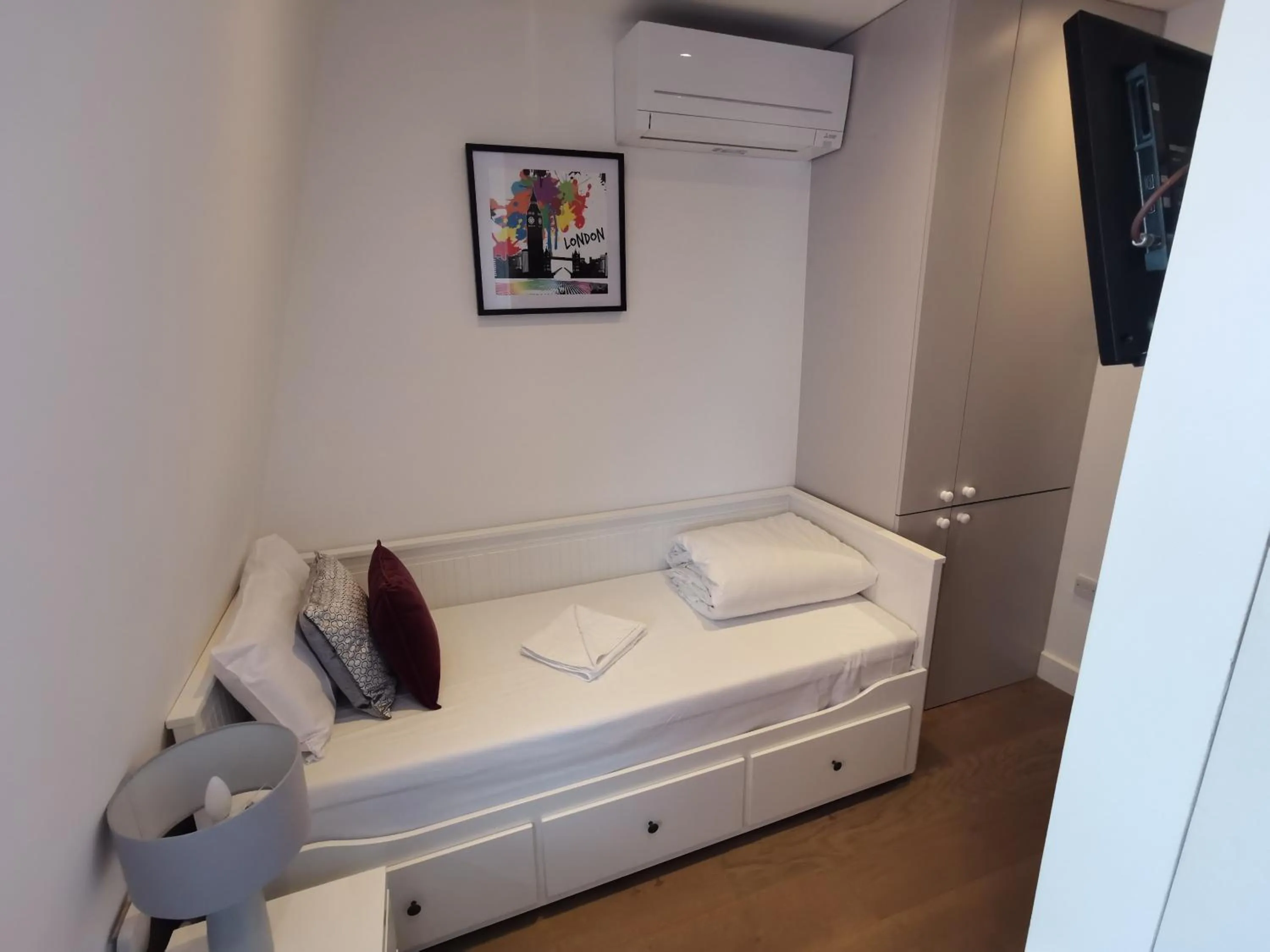 Bed in City Prime Apartments