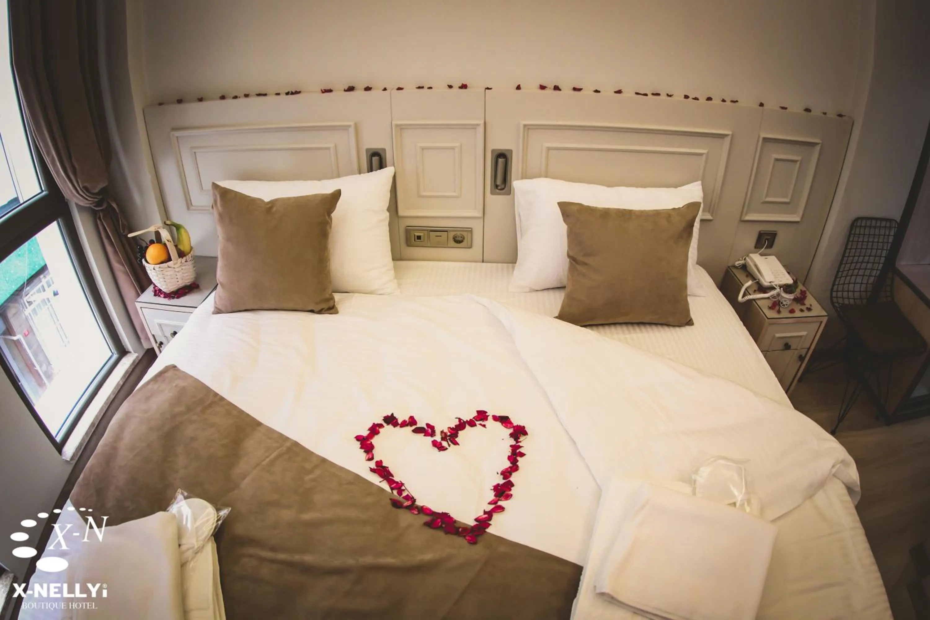 Bed in X-NELLYİ HOTEL