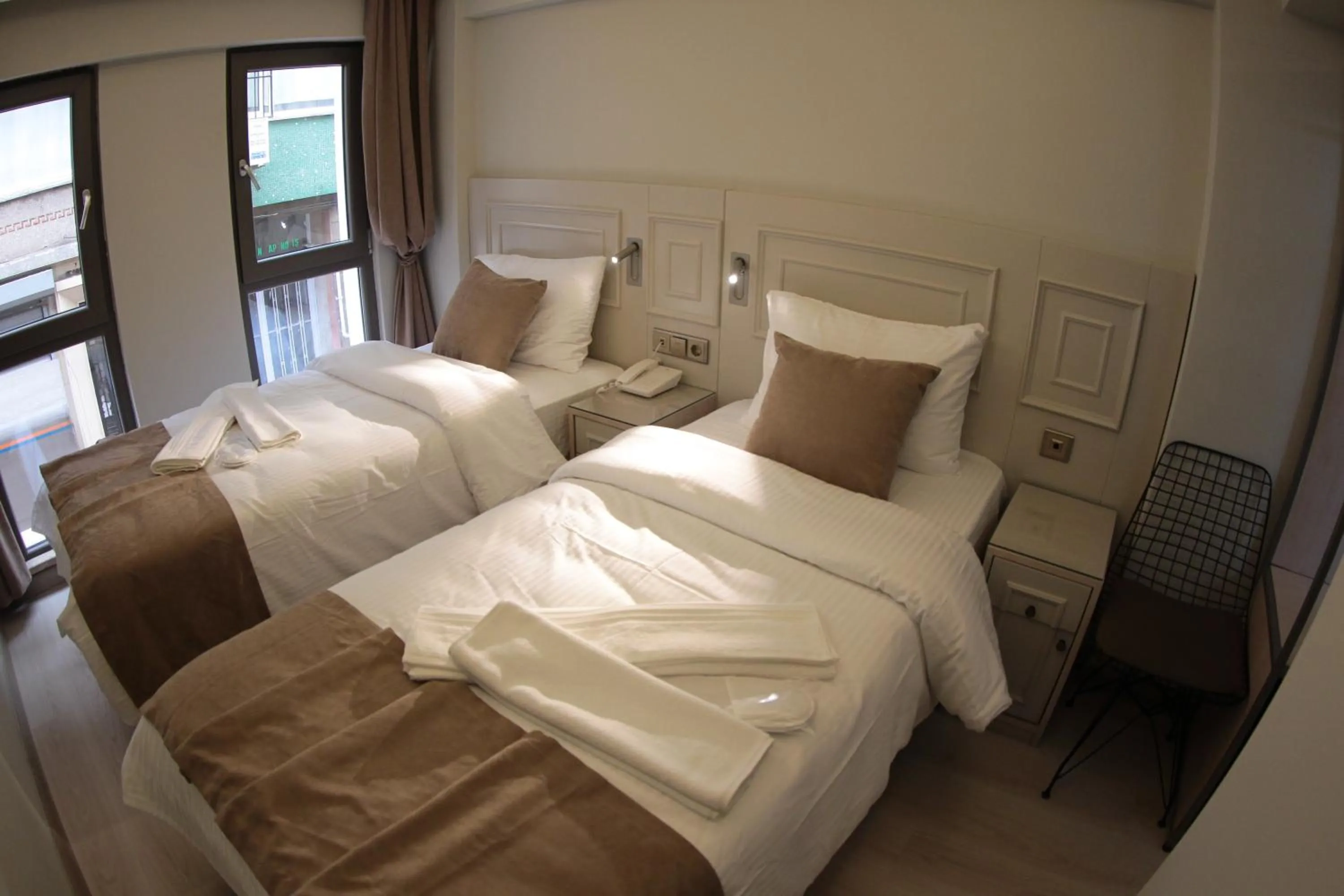 Bed in X-NELLYİ HOTEL