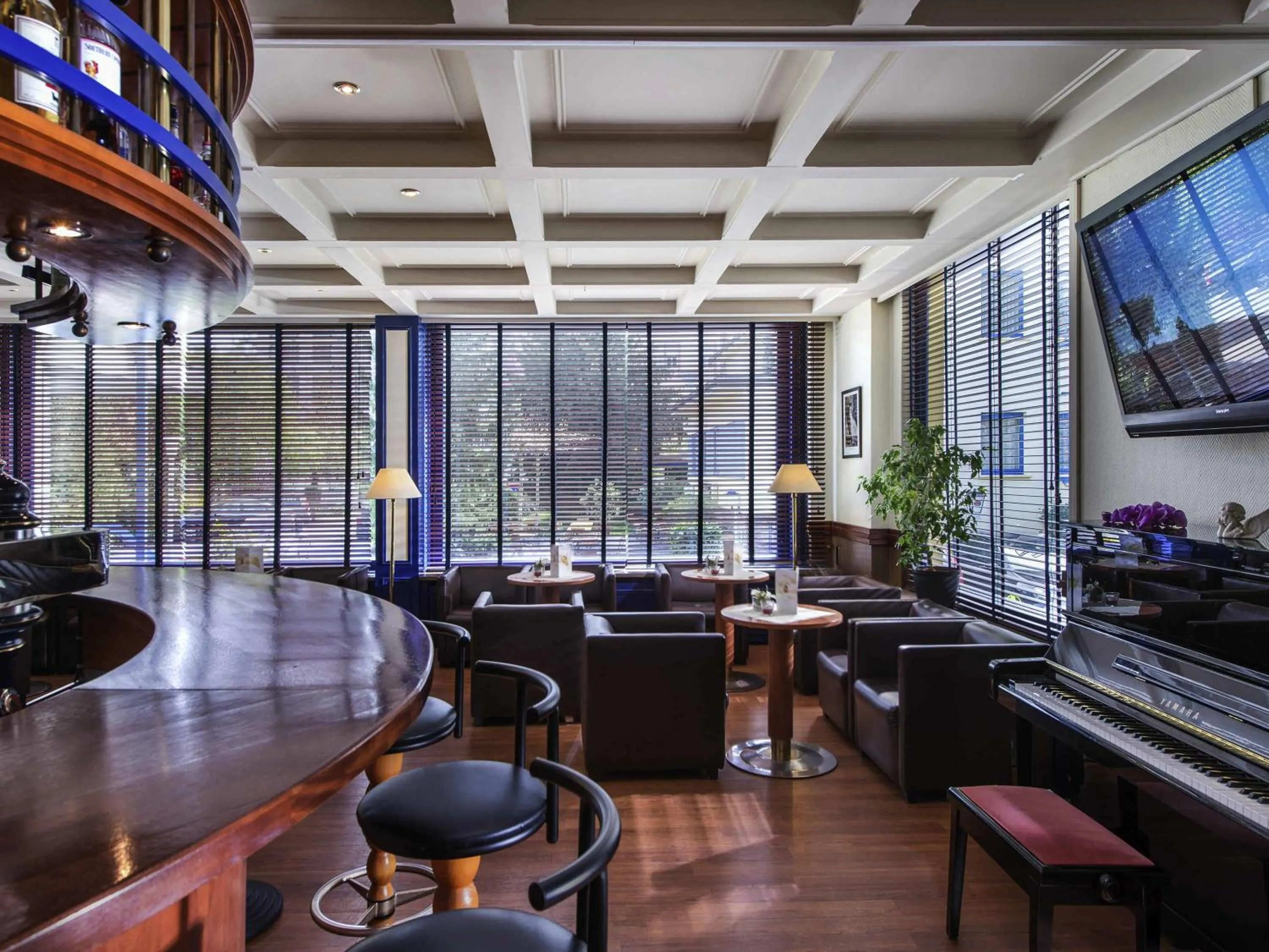 Lounge or bar in Offenburg City Hotel by Belvilla