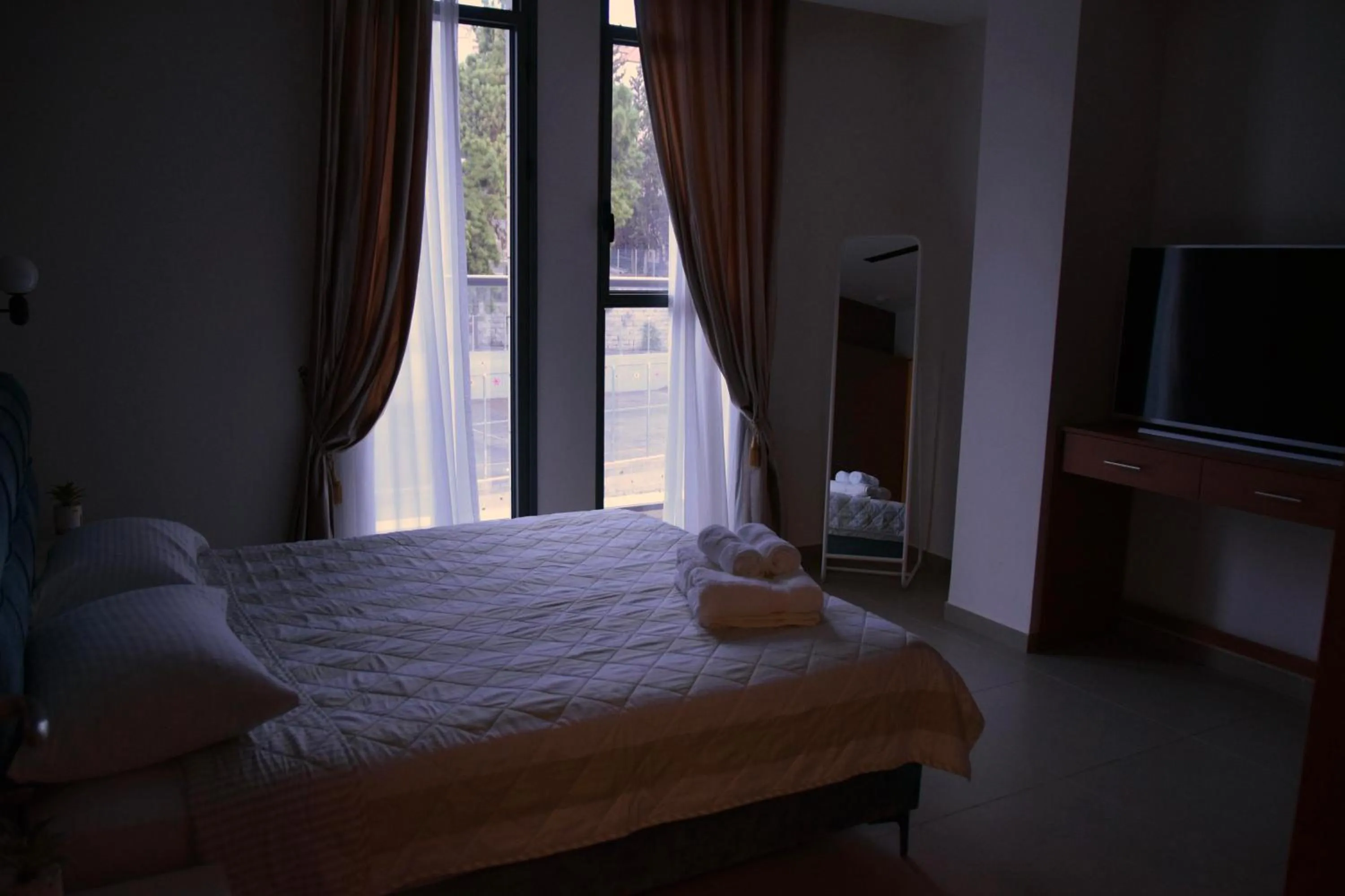 Bed in Amwaj Apartments