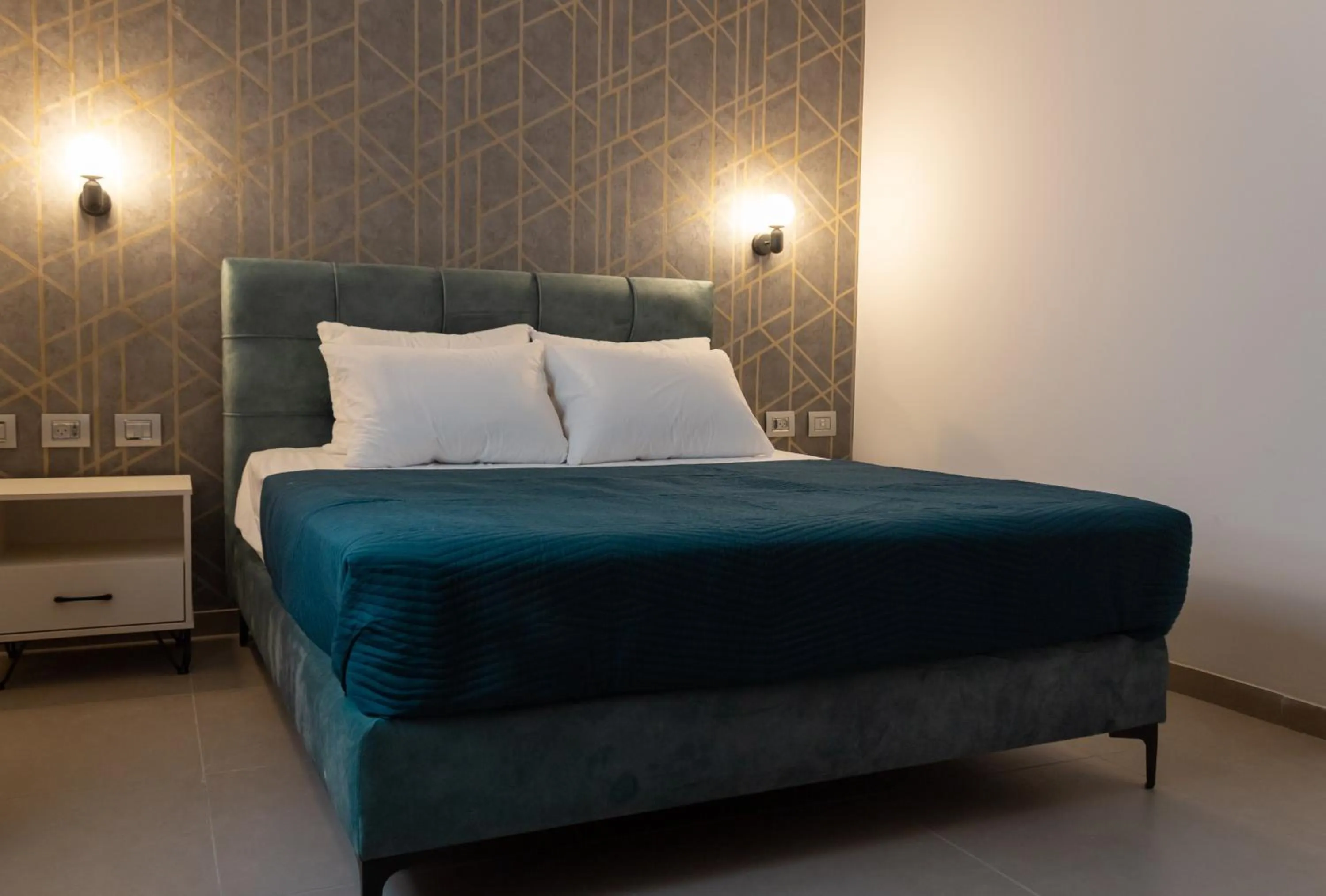 Bed in Amwaj Apartments