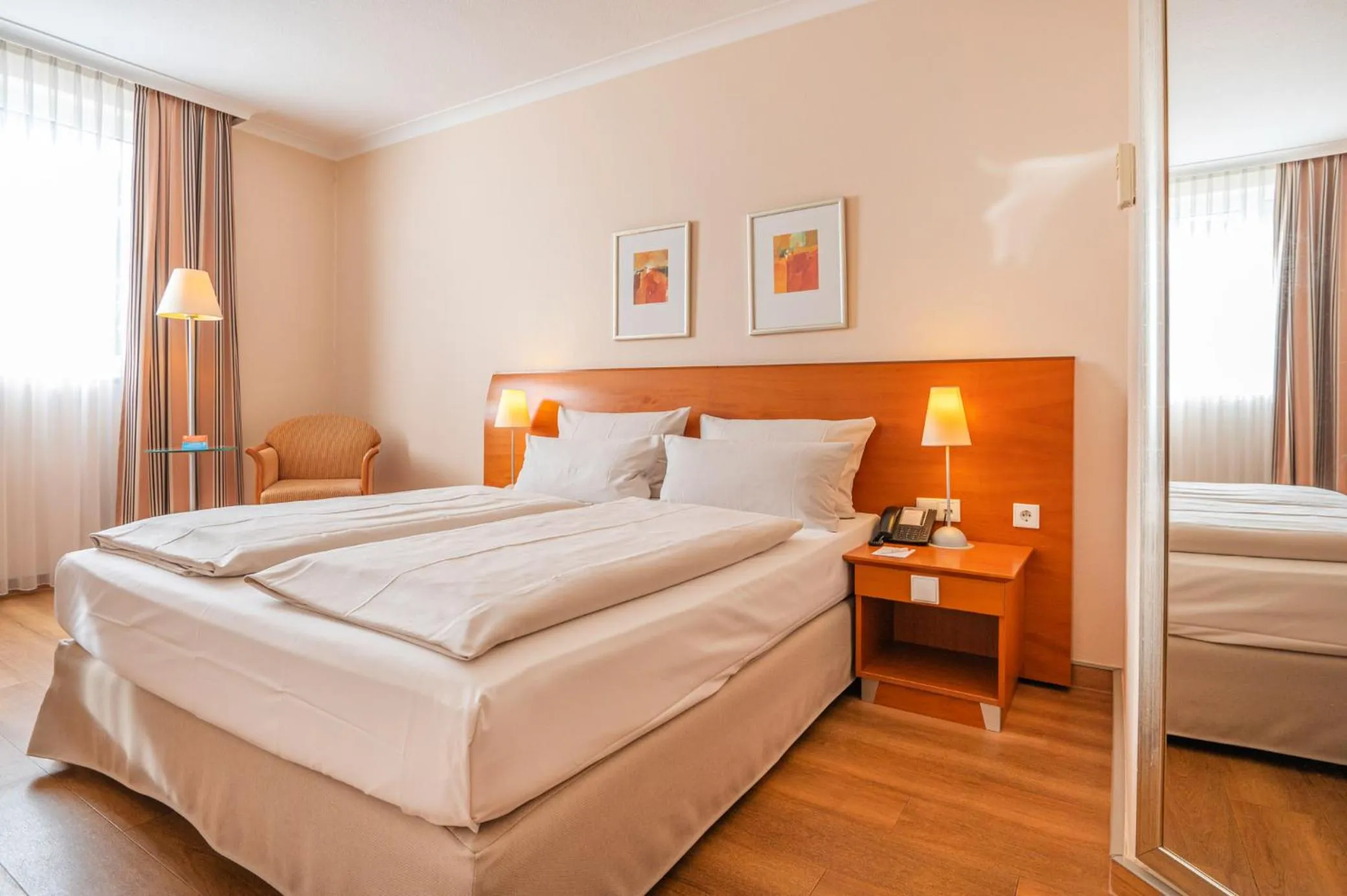 Photo of the whole room, Bed in PhiLeRo Hotel Köln