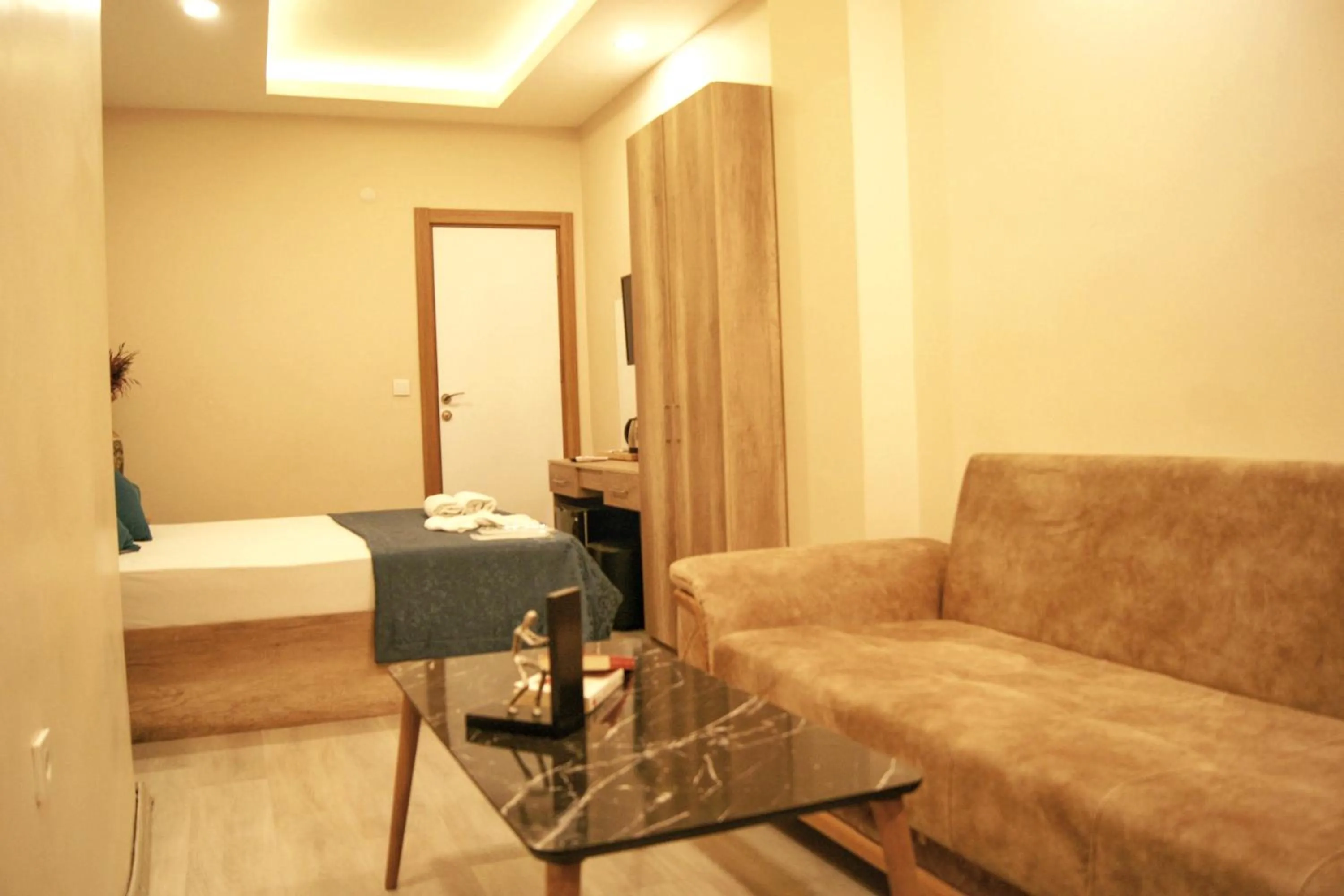 Seating area, Bed in Destinia Pera