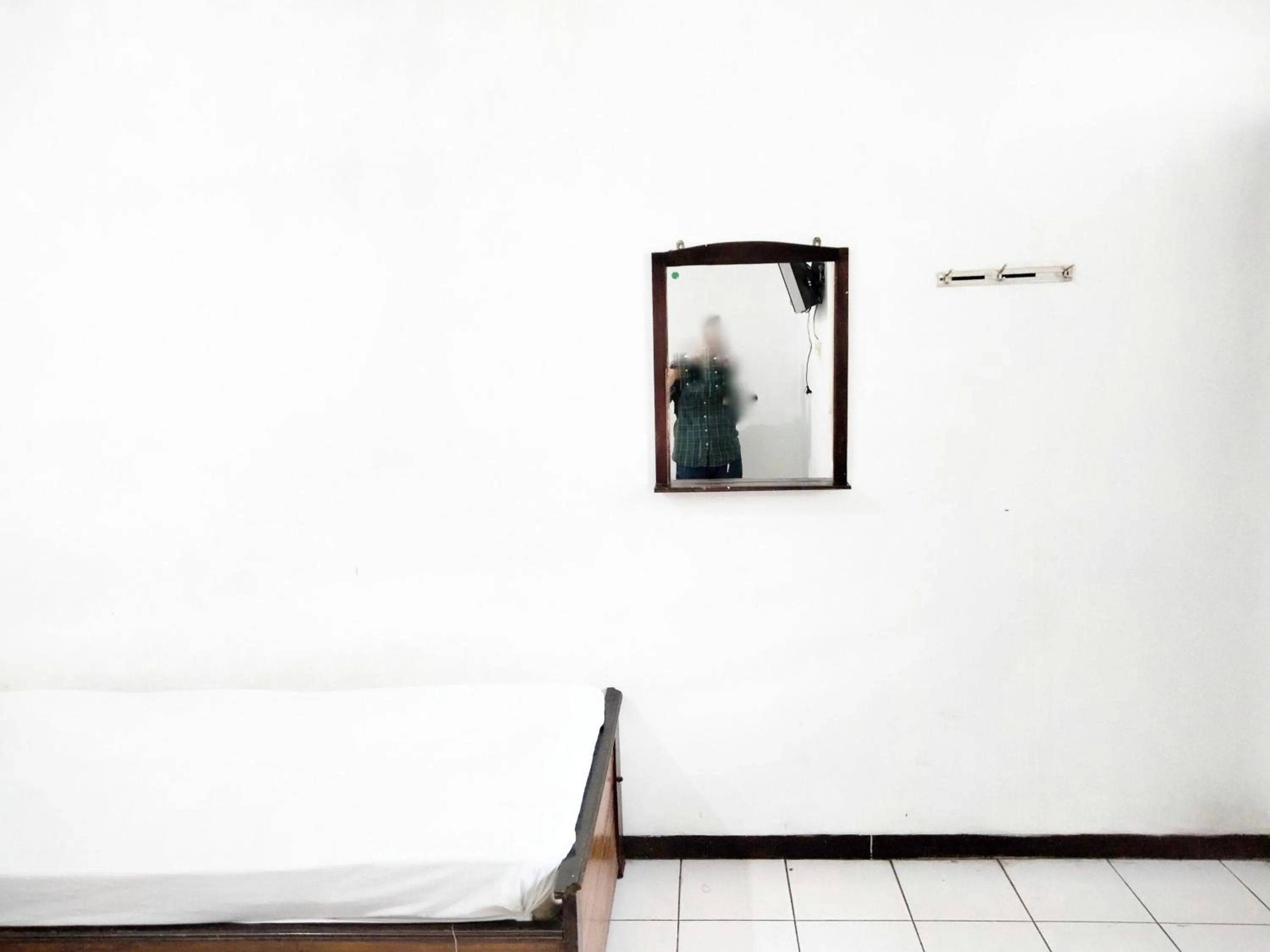 Bedroom in Sartika Hotel Mitra RedDoorz Pati