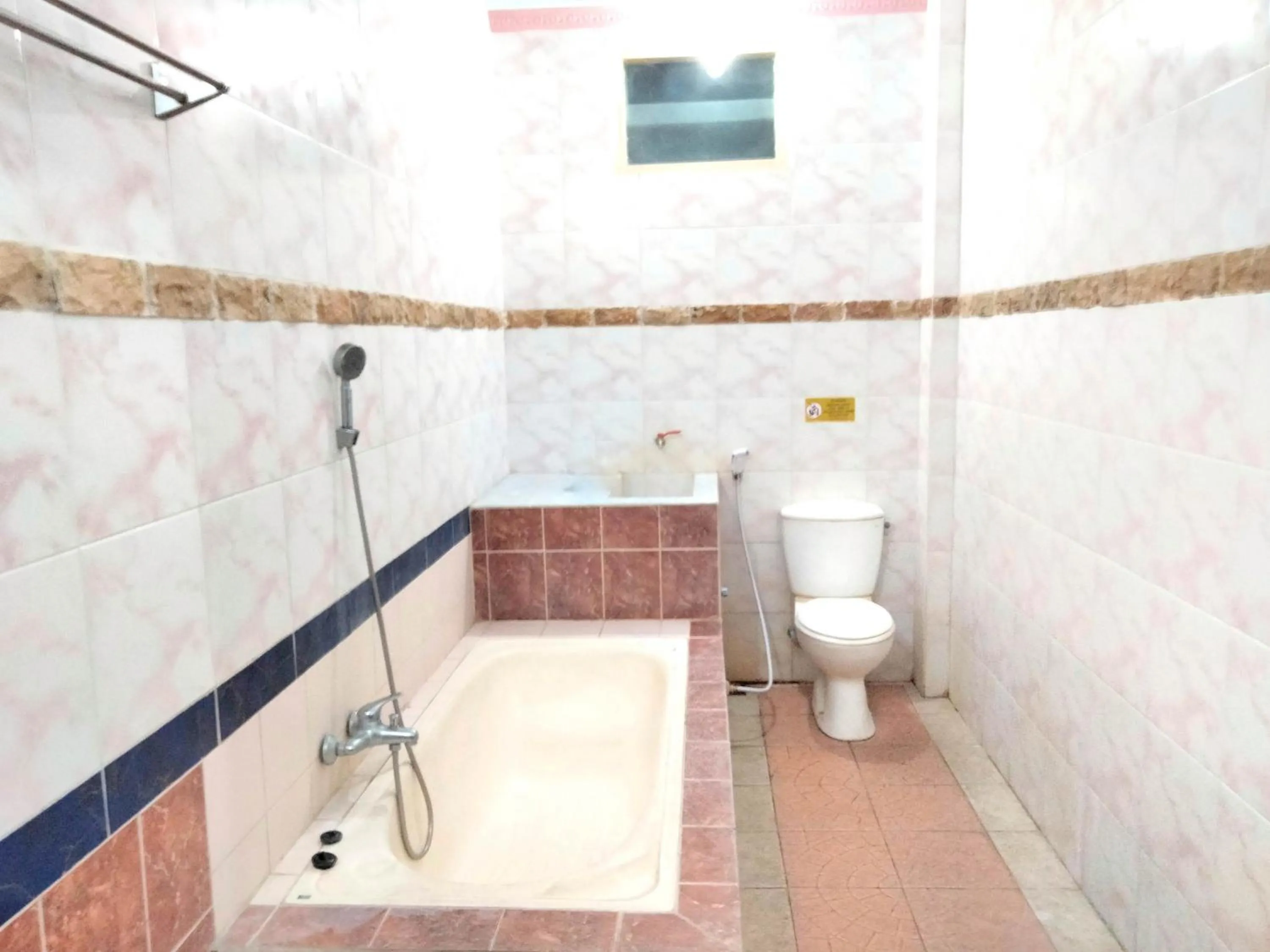 Bathroom in Sartika Hotel Mitra RedDoorz Pati