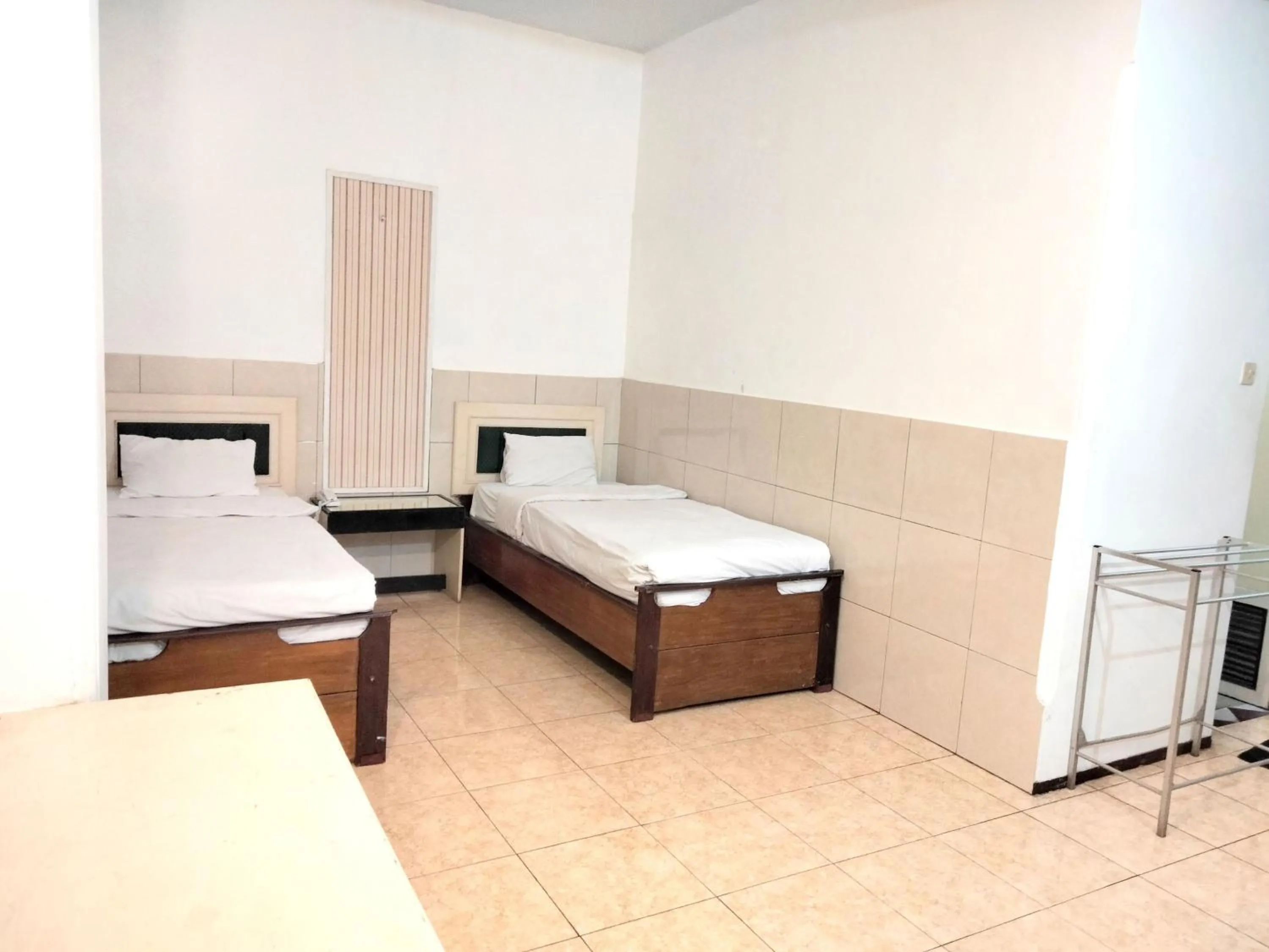 Bedroom, Bed in Sartika Hotel Mitra RedDoorz Pati