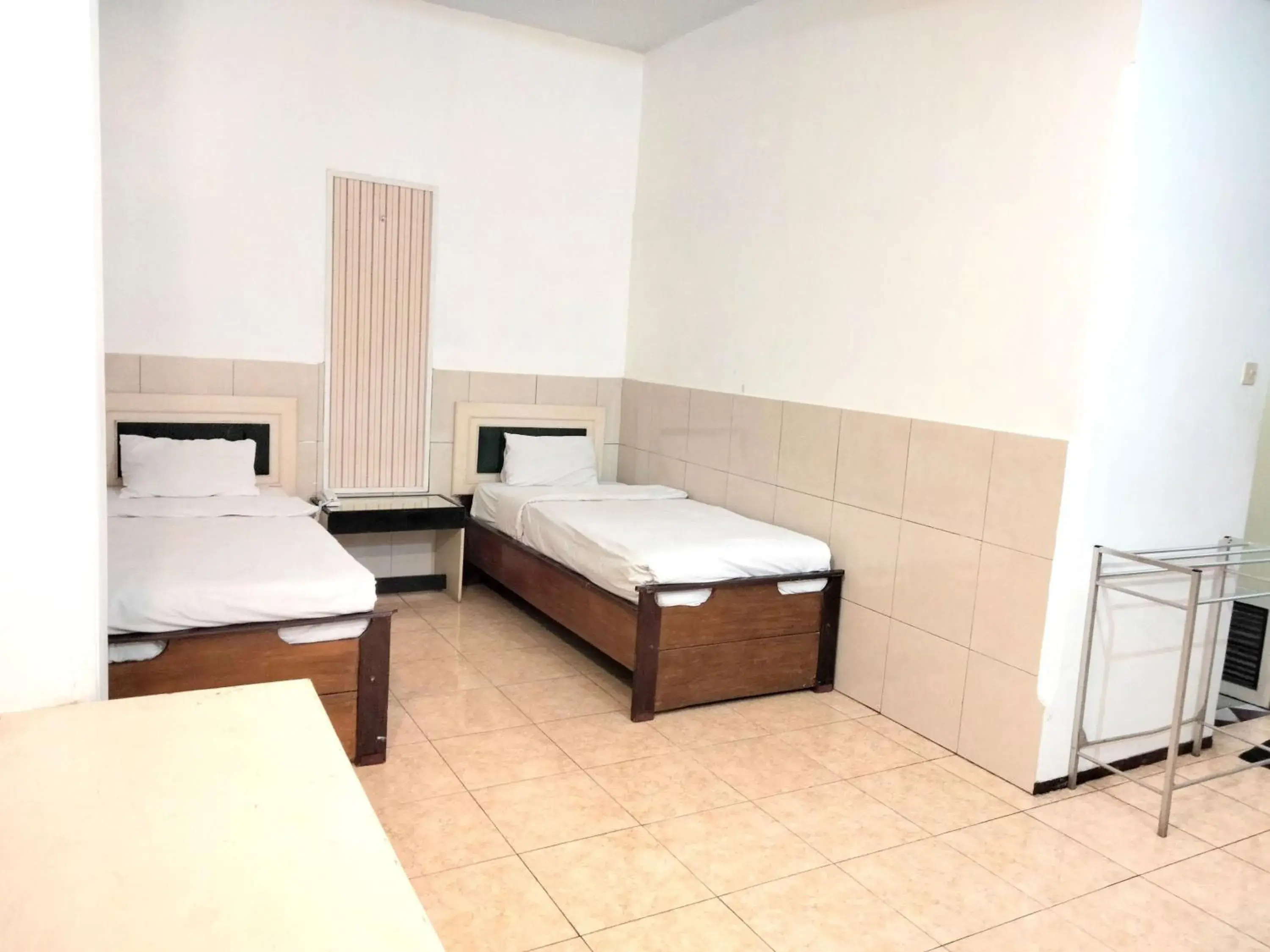 Deluxe Twin Room in Sartika Hotel Mitra RedDoorz Pati Deluxe Twin Room in Sartika Hotel Mitra RedDoorz Pati