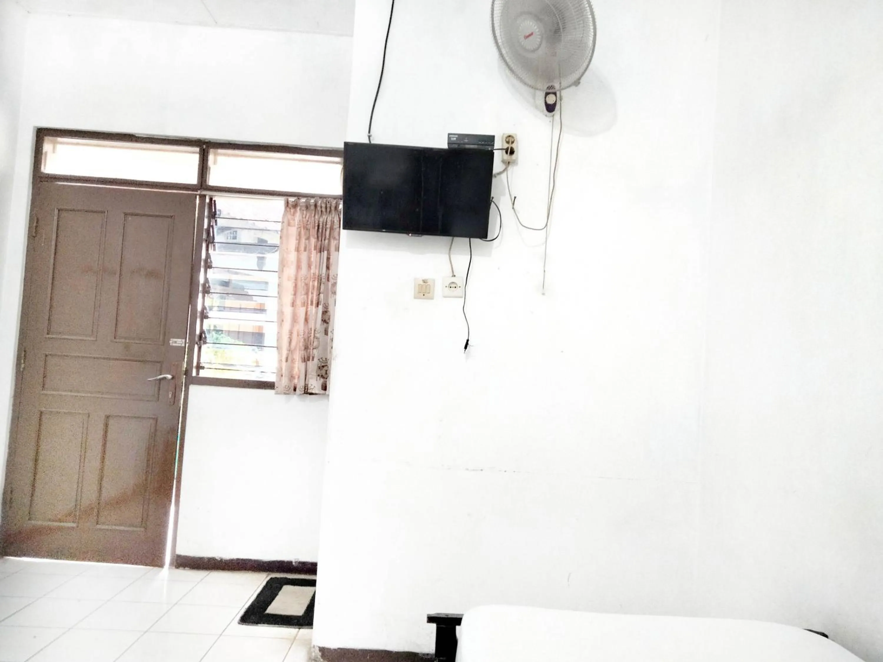 Bedroom, Bed in Sartika Hotel Mitra RedDoorz Pati