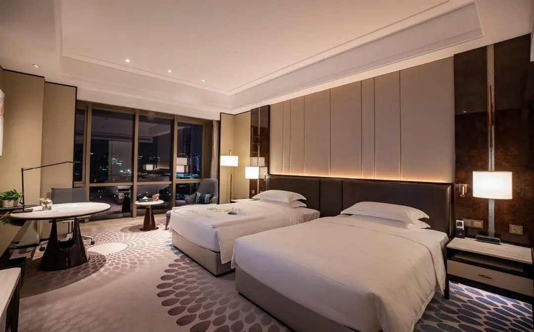 Bed in Vignette Collection Haikou Yatter Hotel by IHG