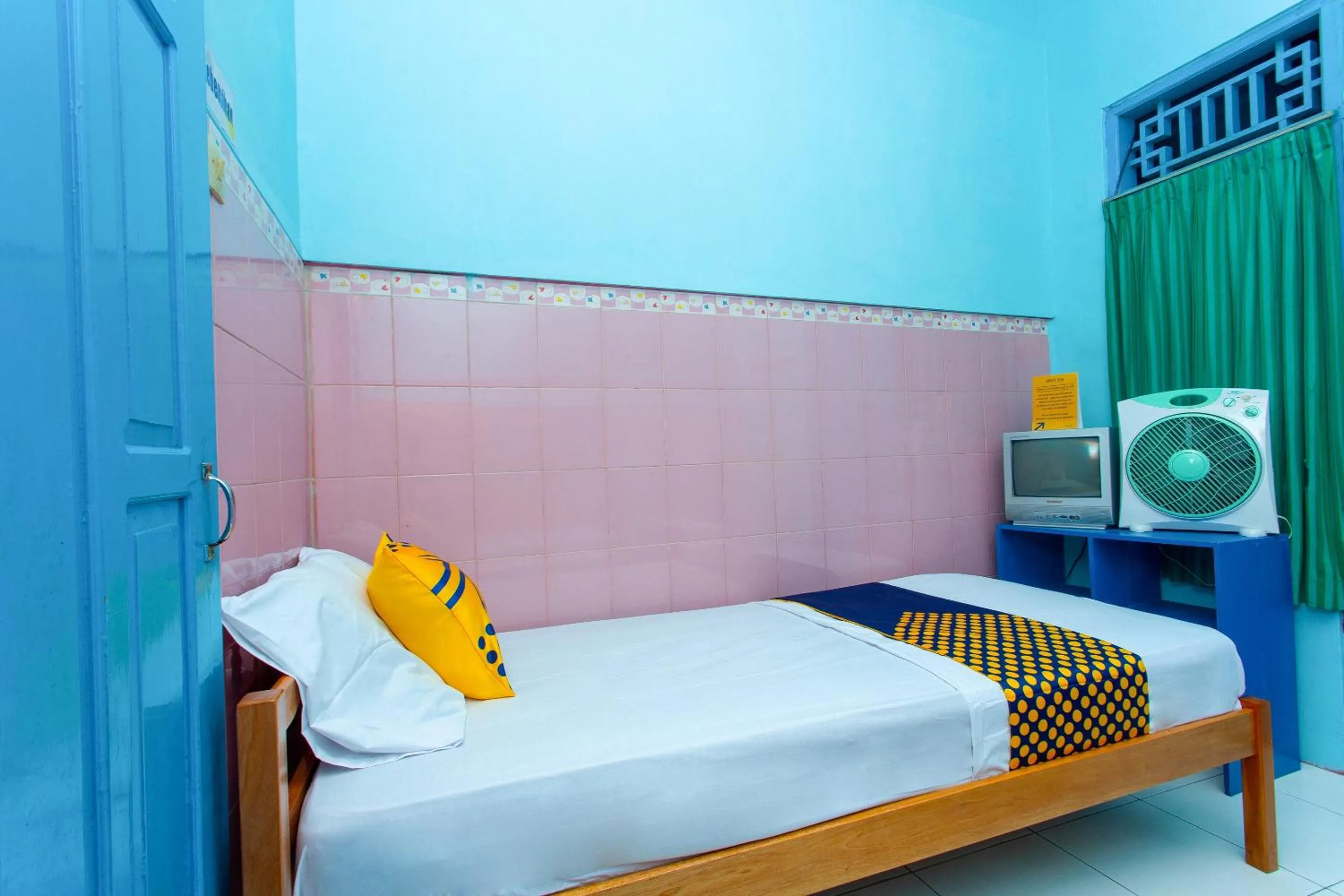 Bedroom in Hotel O Budi