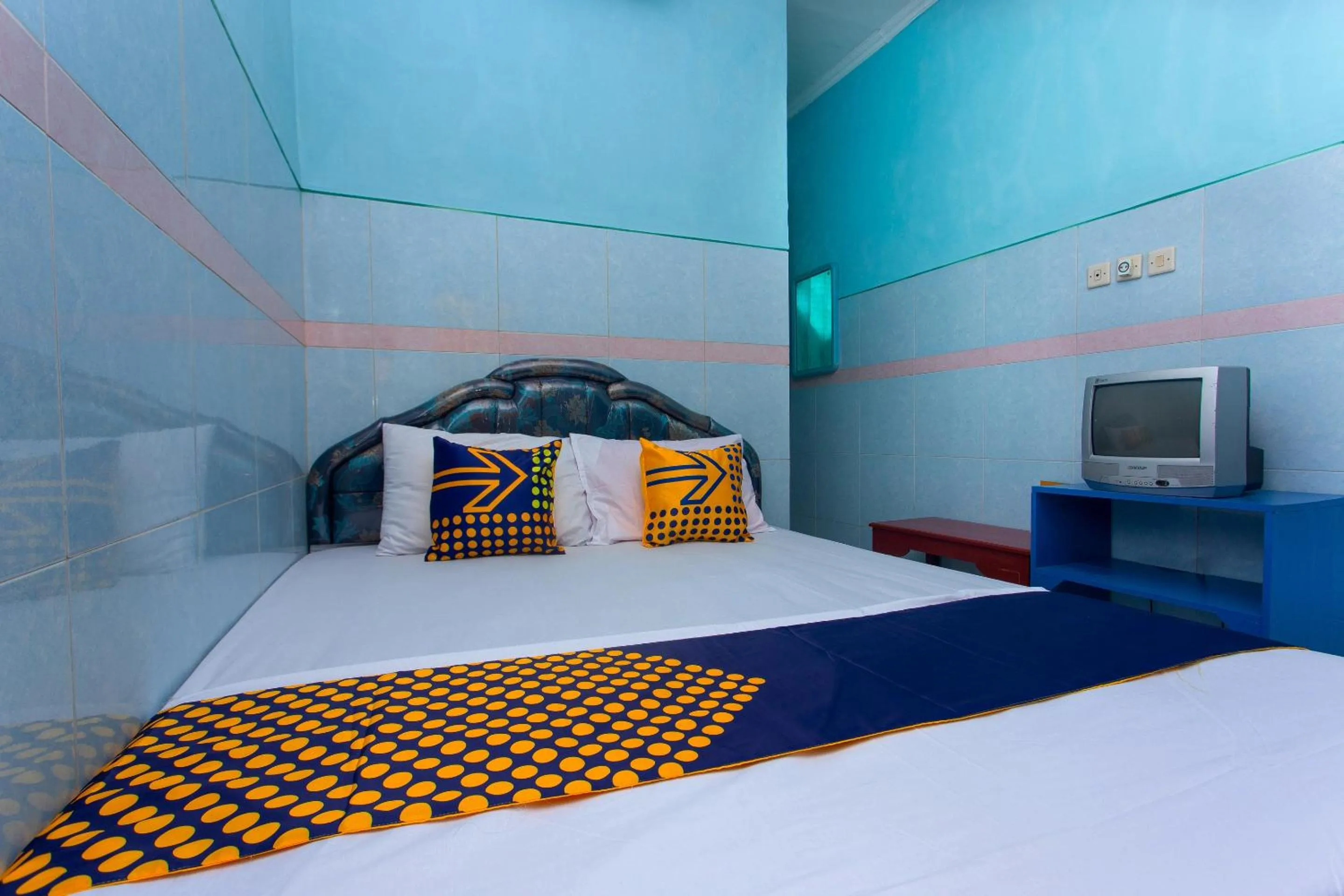 Bedroom in Hotel O Budi