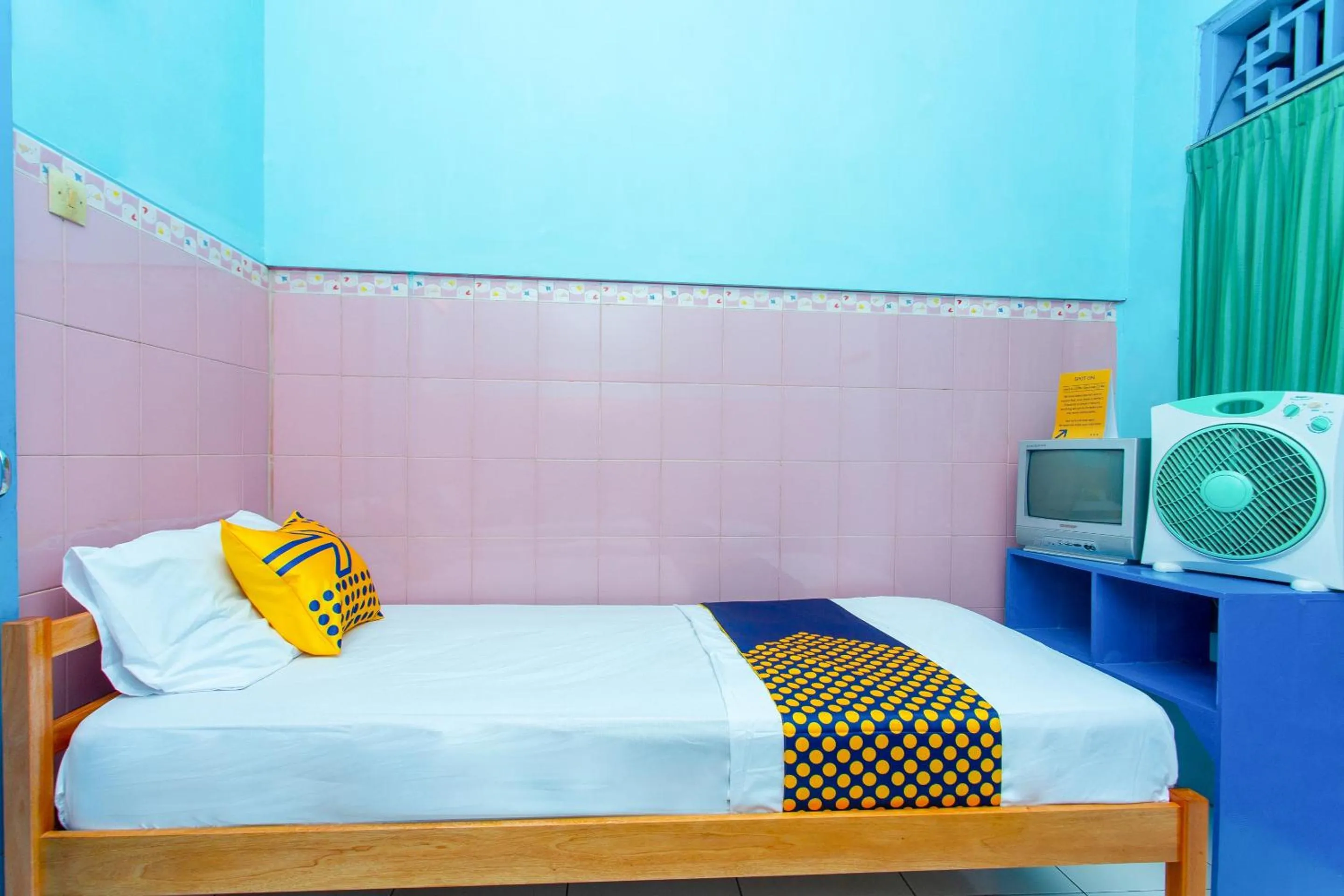 Bedroom in Hotel O Budi