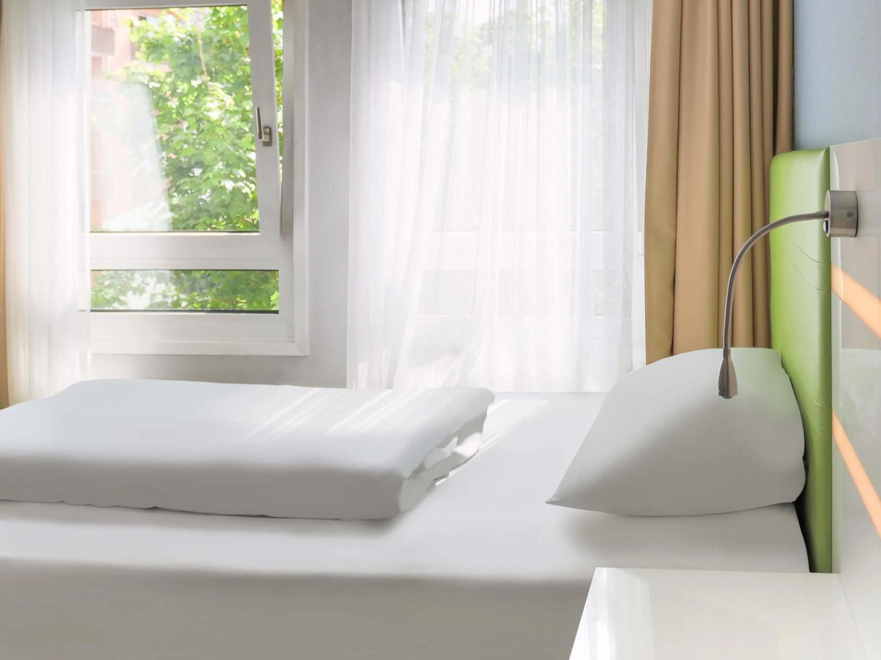 Photo of the whole room, Bed in B&B HOTEL Mannheim-City